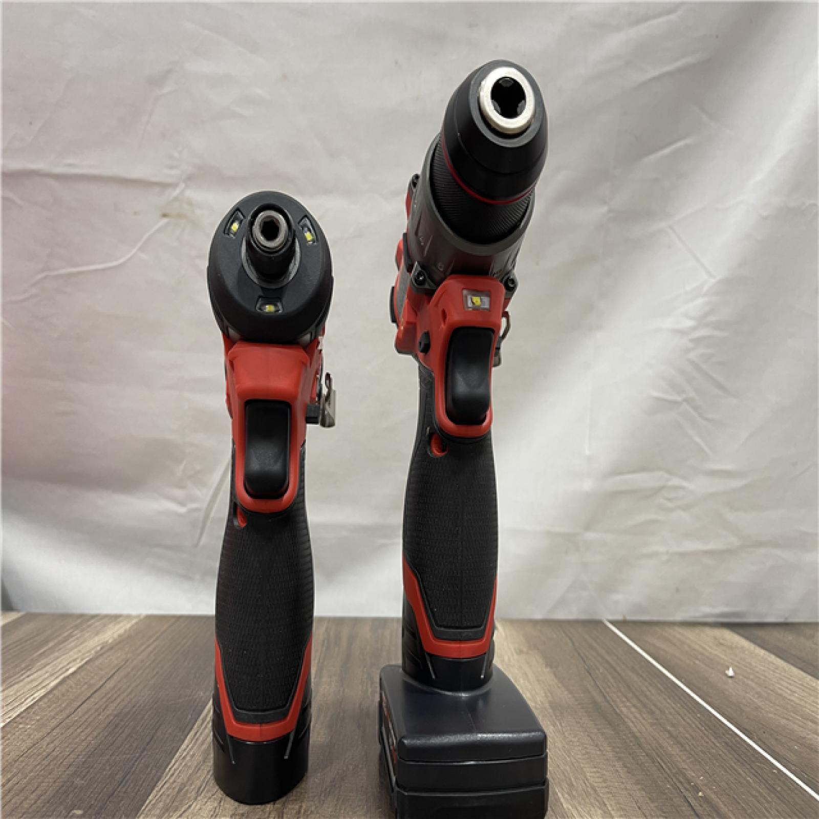 AS-IS Milwaukee FUEL 12-Volt Lithium-Ion Brushless Cordless Hammer Drill and Impact Driver Combo Kit