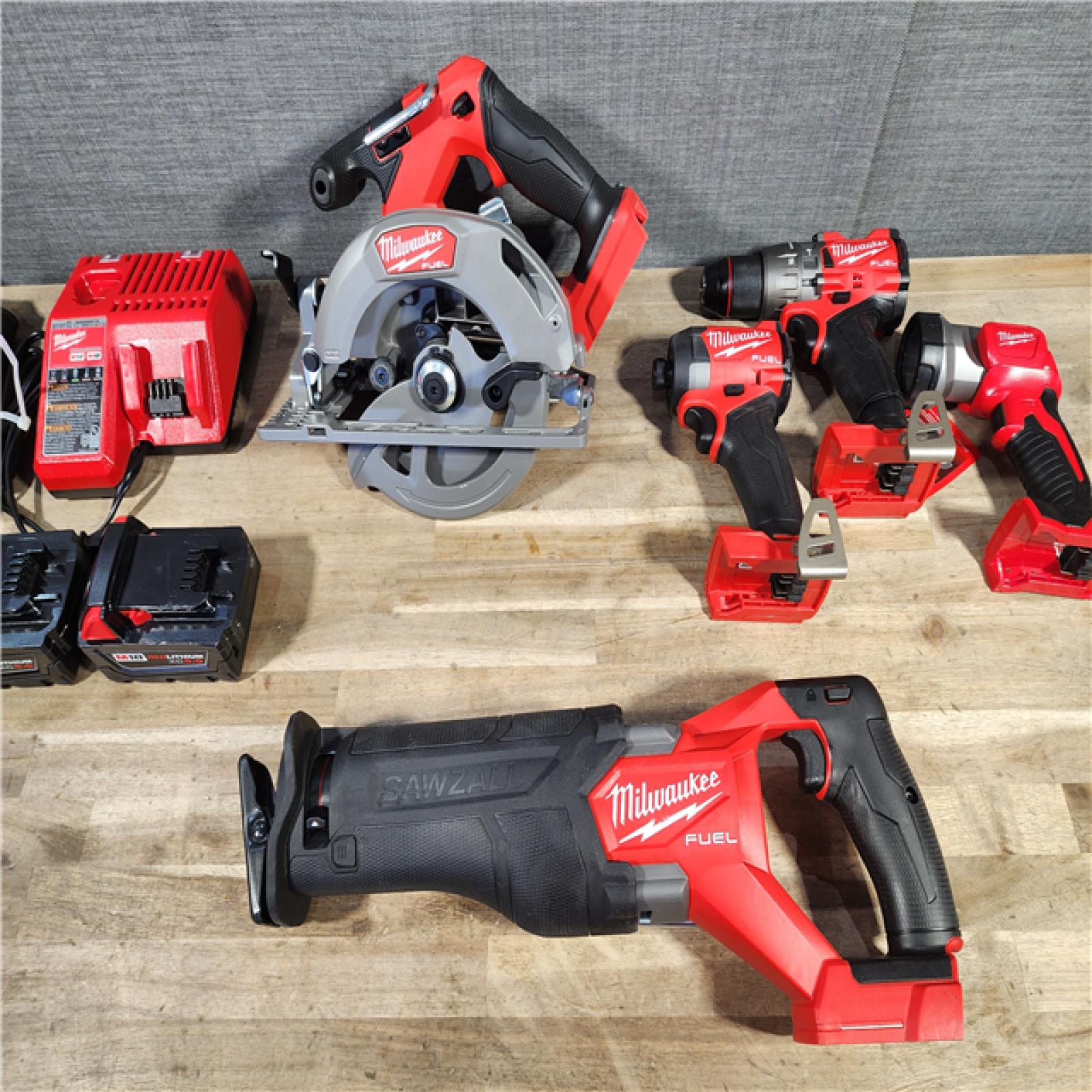 HOUSTON LOCATION - AS-IS (APPEARS LIKE NEW) M18 FUEL 18V Lithium-Ion Brushless Cordless Combo Kit (5-Tool) with Two 5.0 Ah Batteries, 1 Charger 1 Tool Bag
