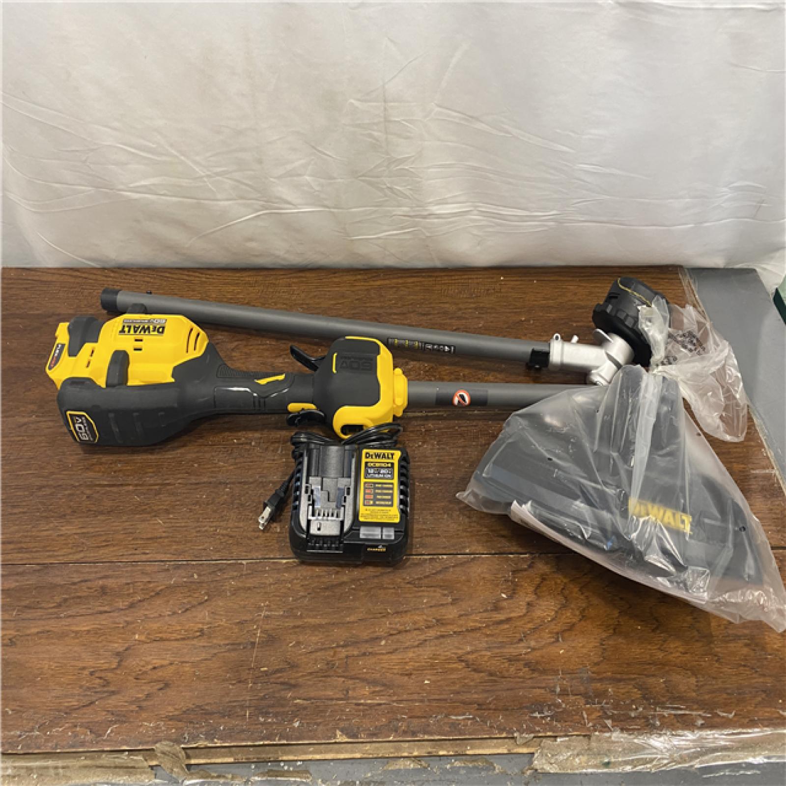AS-IS DEWALT FLEXVOLT 60V MAX 17 in. Cordless Battery Powered Attachment Capable Trimmer Kit with (1) FLEXVOLT 3 Ah Battery & Charger