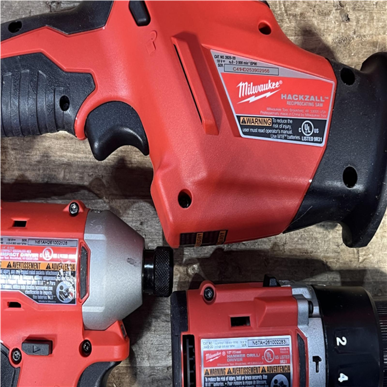 Houston Location AS-IS Milwaukee Hammer Drill Driver and Impact Driver Hackzall and Circular Saw and Batteries QTY/2 with Charger