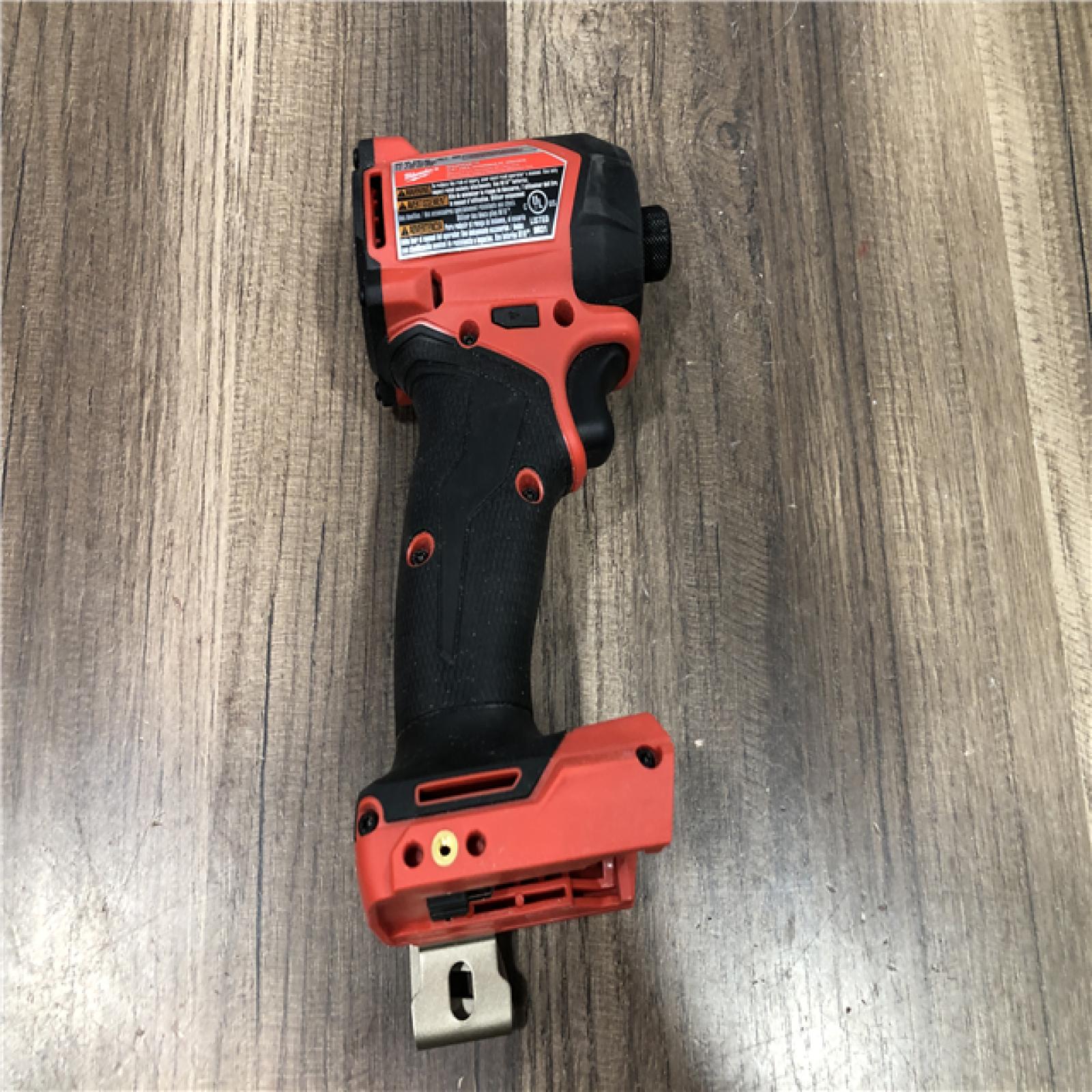 AS-IS Milwaukee FUEL SURGE 18V Lithium-Ion Brushless Cordless 1/4 in. Hex Impact Driver (Tool-Only)