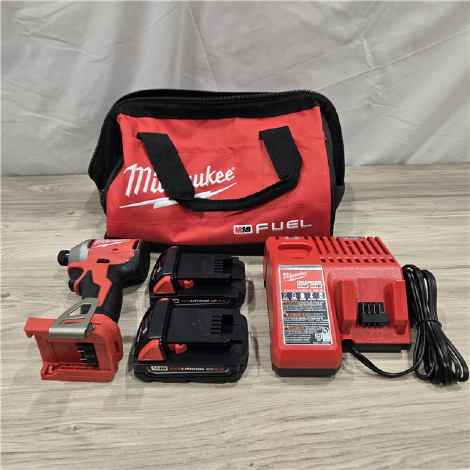 AS-IS Milwaukee M18 Compact Brushless 1/4  Hex Impact Driver Kit