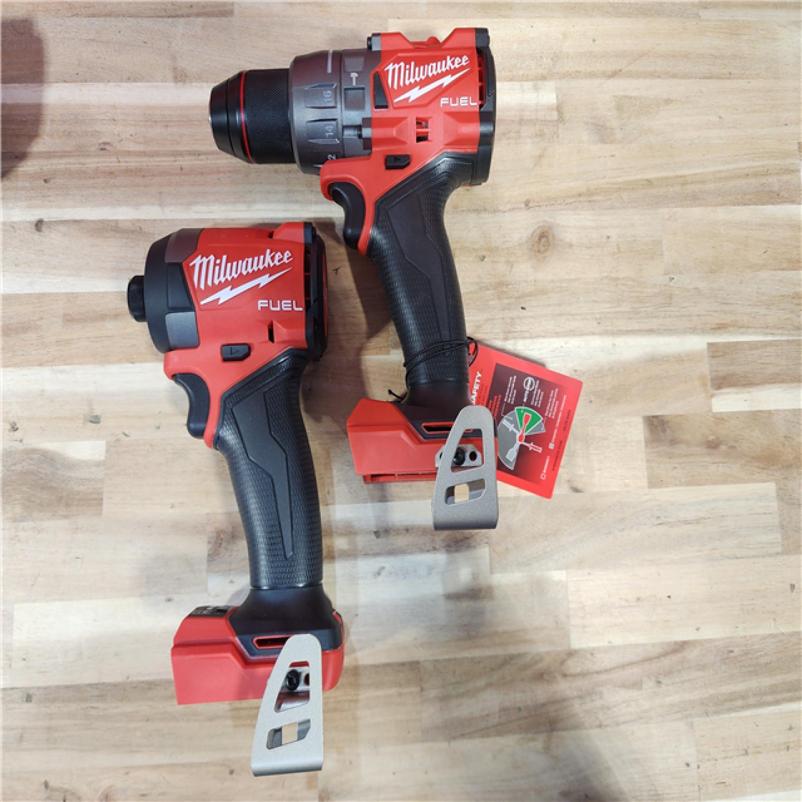 HOUSTON LOCATION - AS-IS (APPEARS LIKE NEW) Milwaukee  FUEL 18V Lithium-Ion Brushless Cordless Hammer Drill and Impact Driver Combo Kit