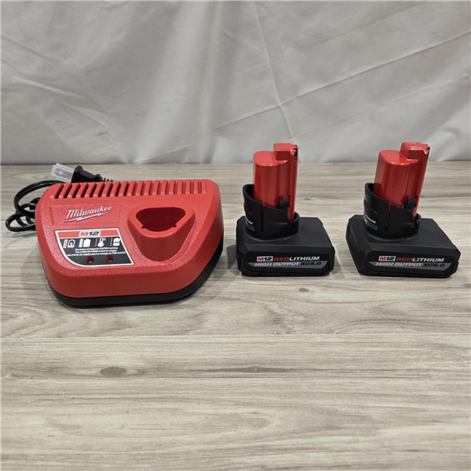 AS-IS Milwaukee M12 12V Lithium-Ion XC High Output 5.0 Ah Battery Pack (2-Pack) Starter Kit