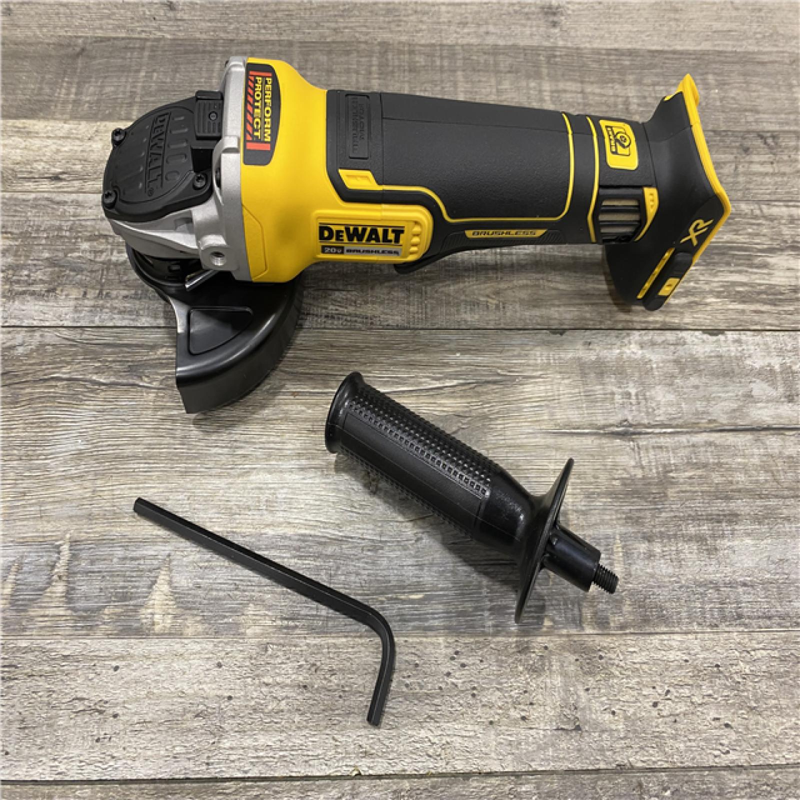 AS-IS DEWALT 20-Volt MAX XR Lithium-Ion Cordless Brushless 4-1/2 in. Paddle Switch Small Angle Grinder w/ Kickback Brake (Tool-Only)