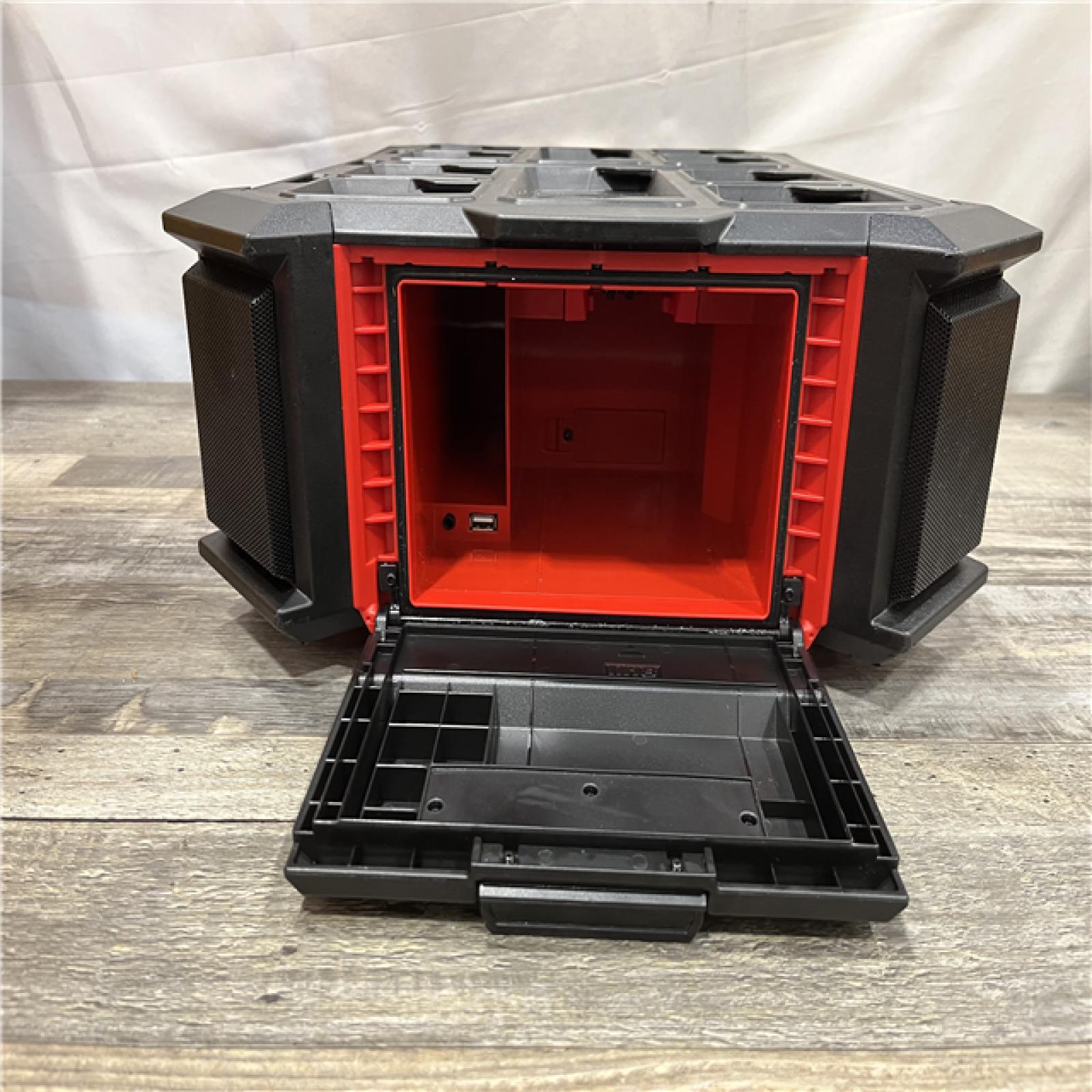 AS-IS Milwaukee  Lithium-Ion Cordless PACKOUT Radio/Speaker with Built-In Charger