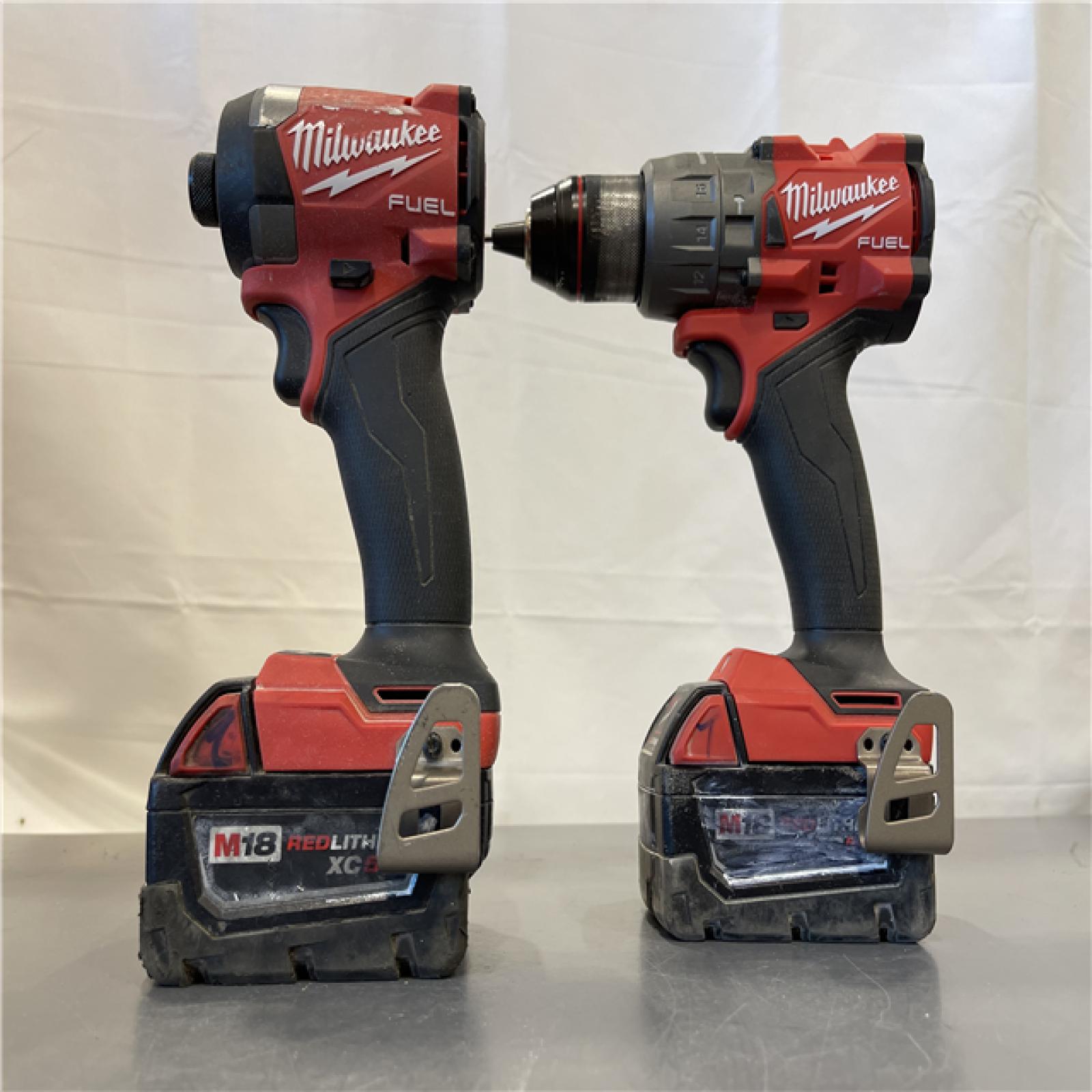 AS-IS - MILWAUKEE FUEL 18V Lithium-Ion Brushless Cordless Hammer Drill and Impact Driver Combo Kit (2-Tool) with 2 Batteries