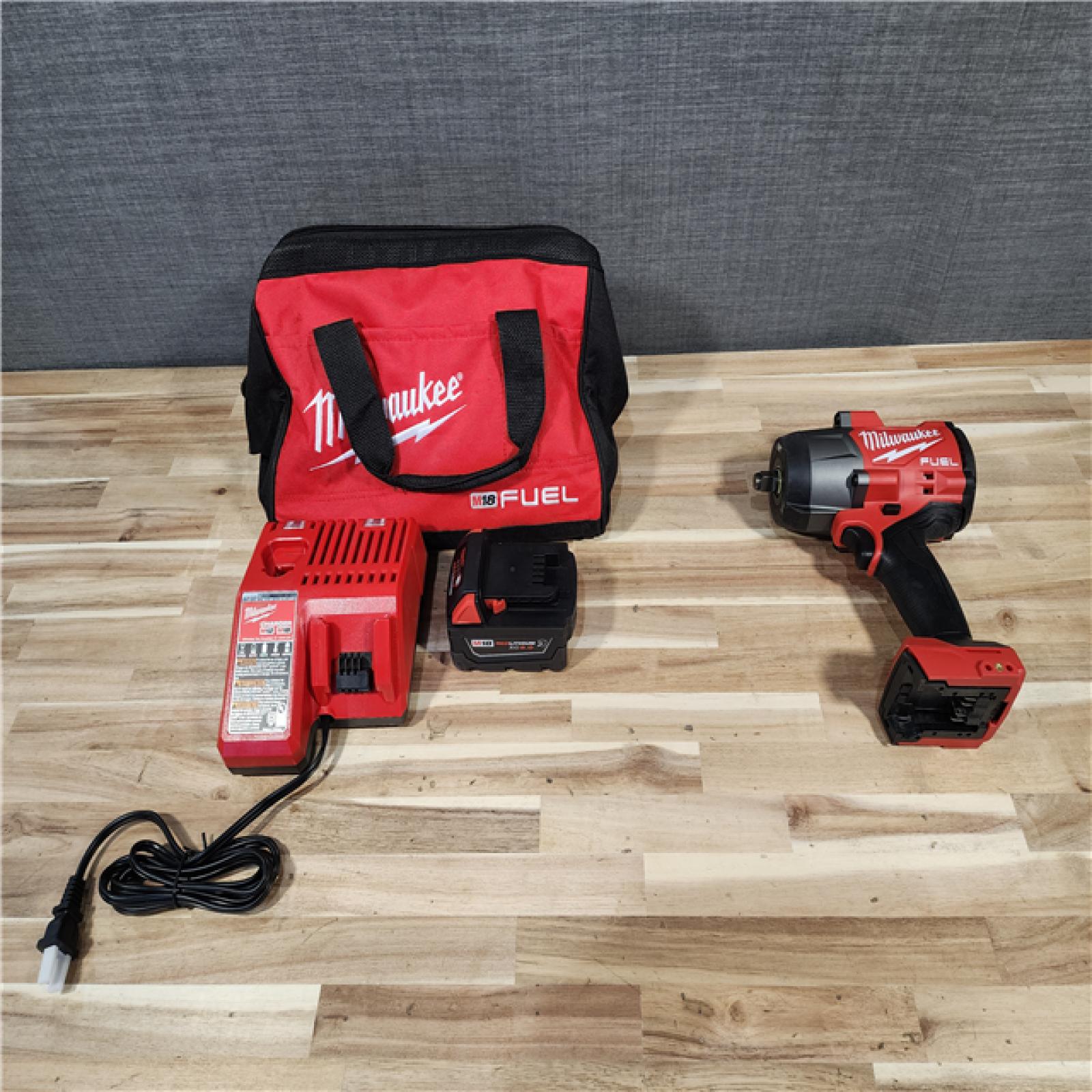 HOUSTON LOCATION - AS-IS (APPEARS LIKE NEW) Milwaukee  FUEL 18V Lithium-Ion Brushless Cordless 1/2 in. Impact Wrench w/Friction Ring Kit