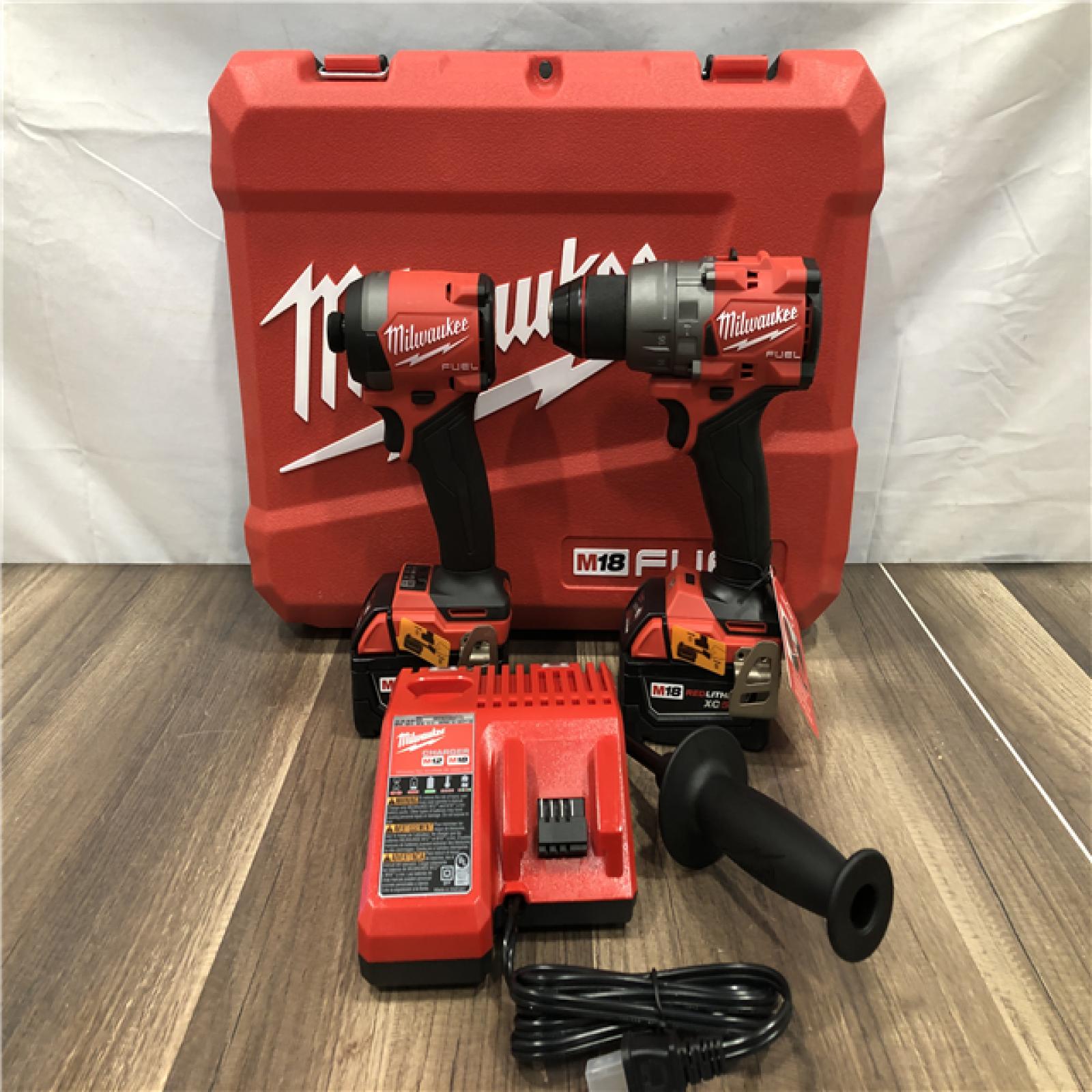 AS-IS Milwaukee FUEL 18V Lithium-Ion Brushless Cordless Hammer Drill and Impact Driver Combo Kit