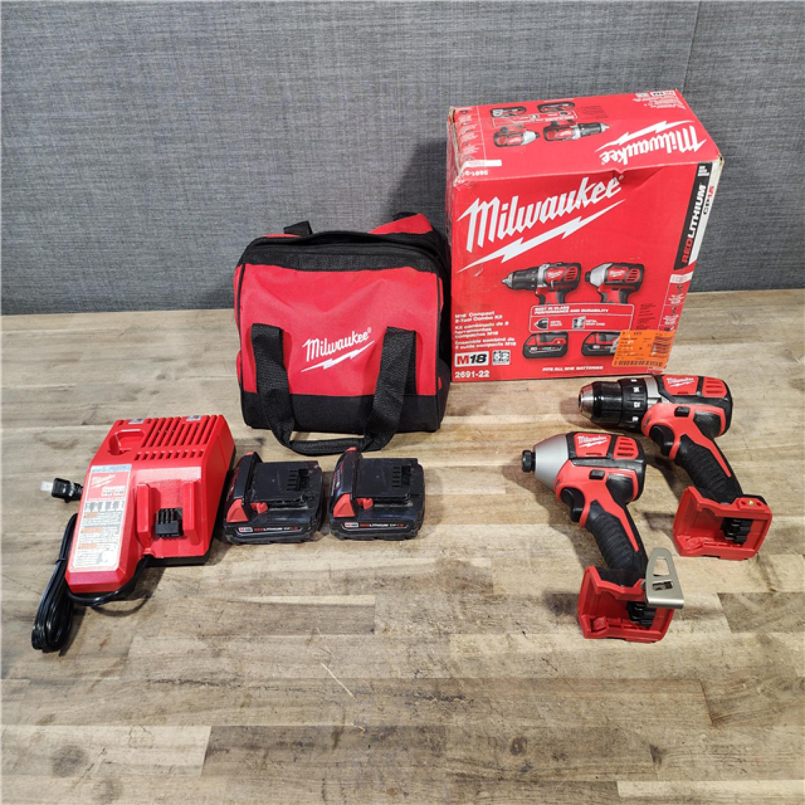 HOUSTON LOCATION - AS-IS Milwaukee 18V Cordless Brushed 2-Tool Drill/Driver and Impact Driver Kit