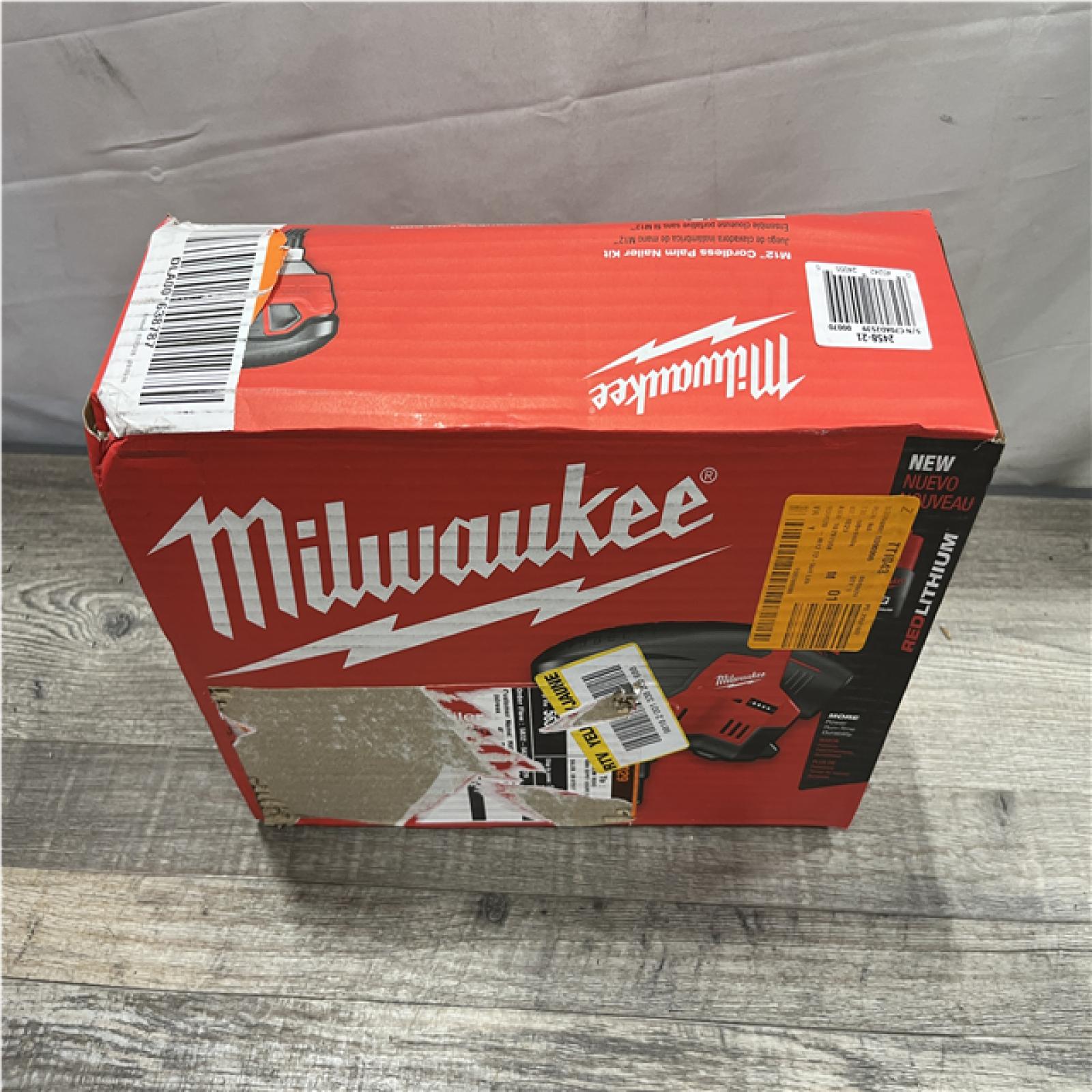 NEW - Milwaukee 12-Volt Lithium-Ion Cordless Palm Nailer Kit