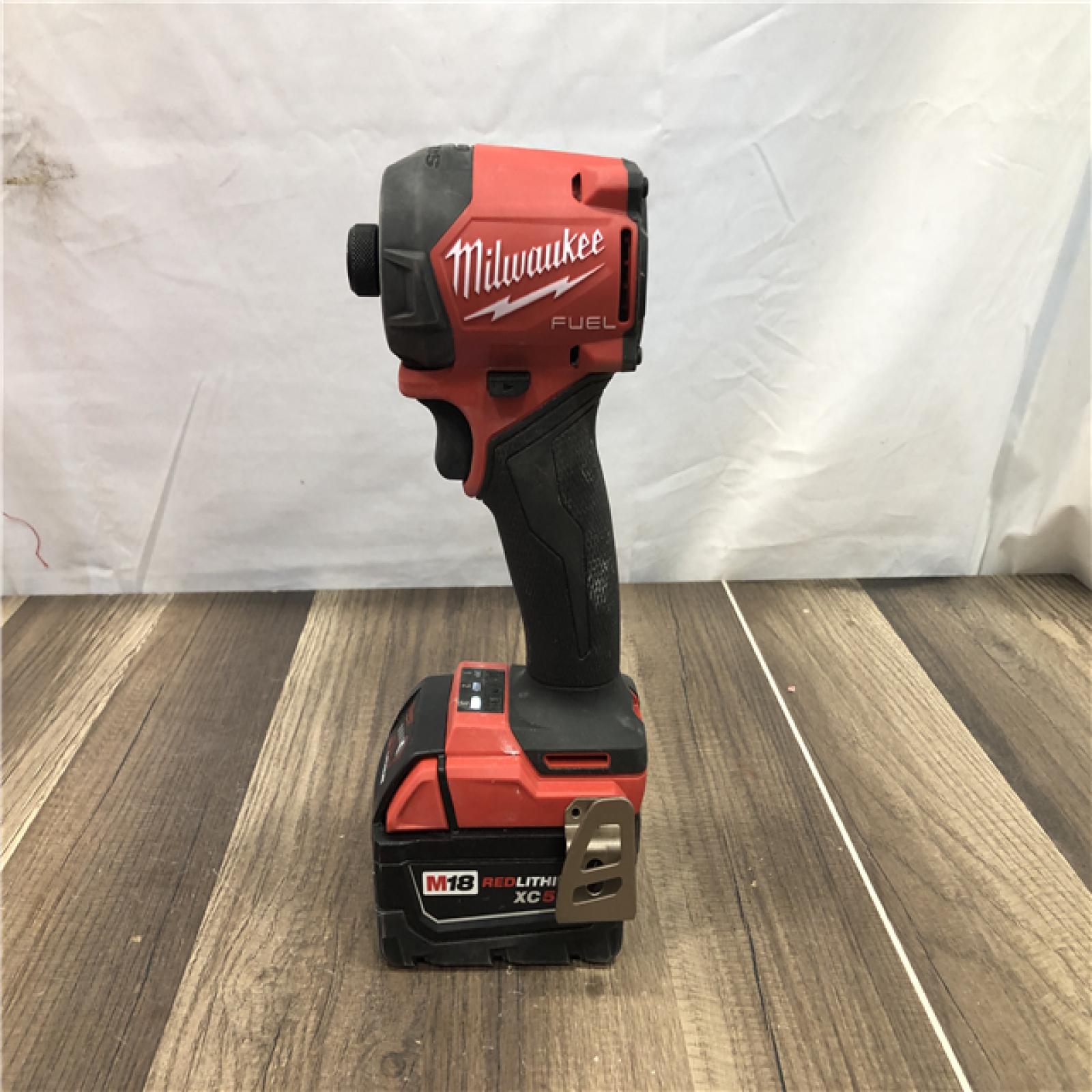 AS-IS Milwaukee FUEL SURGE 18V Lithium-Ion Brushless Cordless 1/4 in. Hex Impact Driver Kit