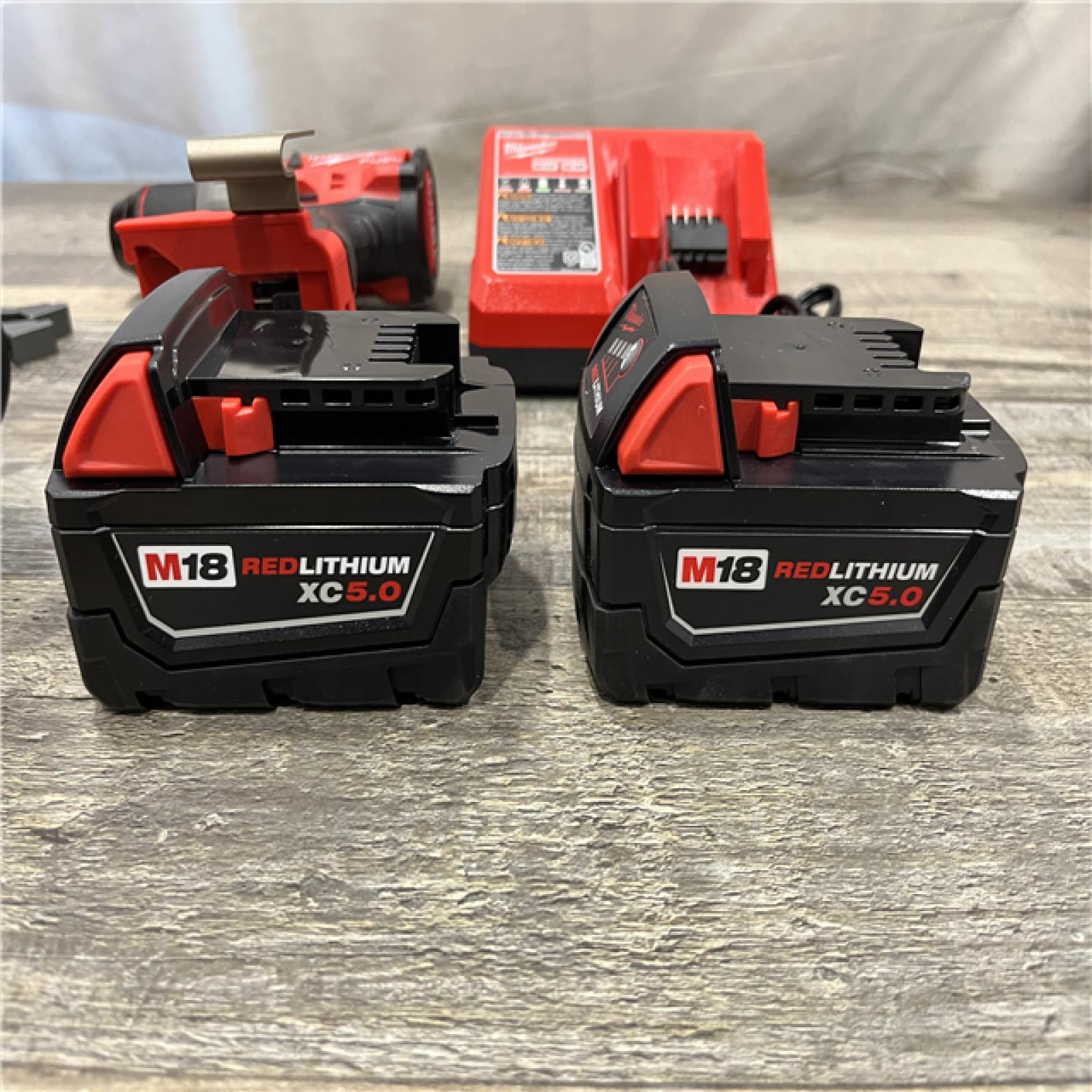 AS-IS Milwaukee FUEL 18V Lithium-Ion Brushless Cordless 1/2 in. Hammer Drill Driver Kit