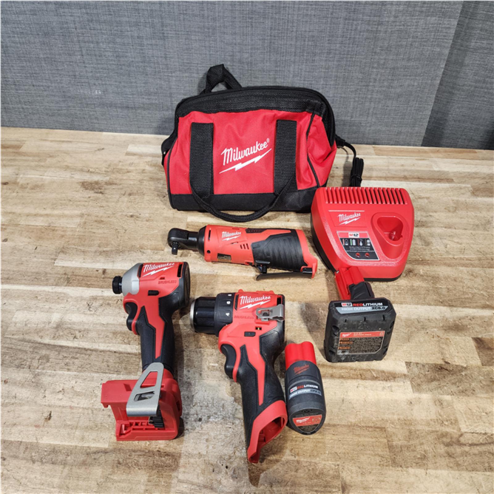 Houston Location AS-IS Milwaukee Drill and Impact and Rachet and Batteries QTY/2 and Charger