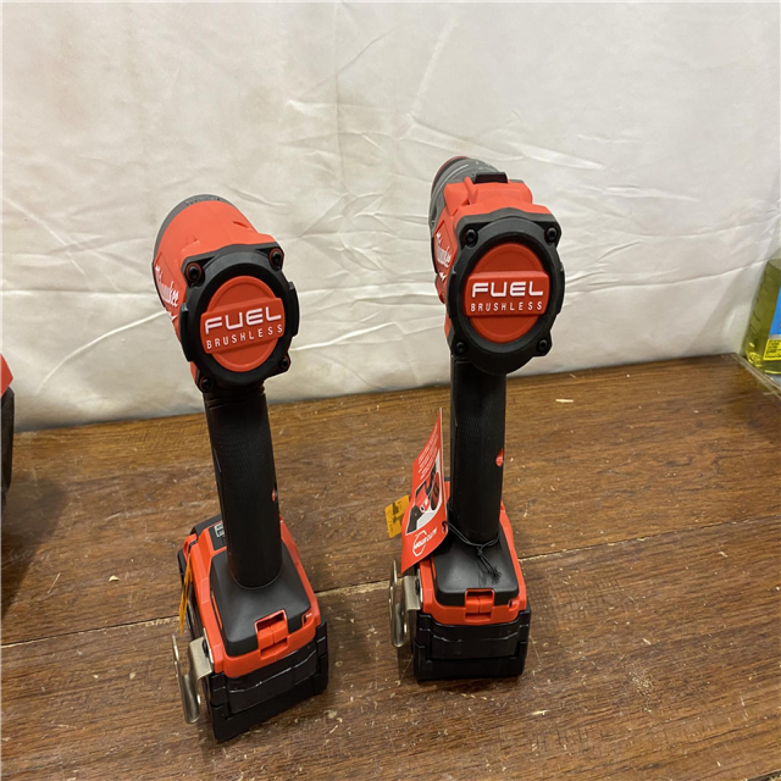 AS-IS MILWAUKEE M18 FUEL 18V Lithium-Ion Brushless Cordless Hammer Drill and Impact Driver Combo Kit (2-Tool) with 2 Batteries