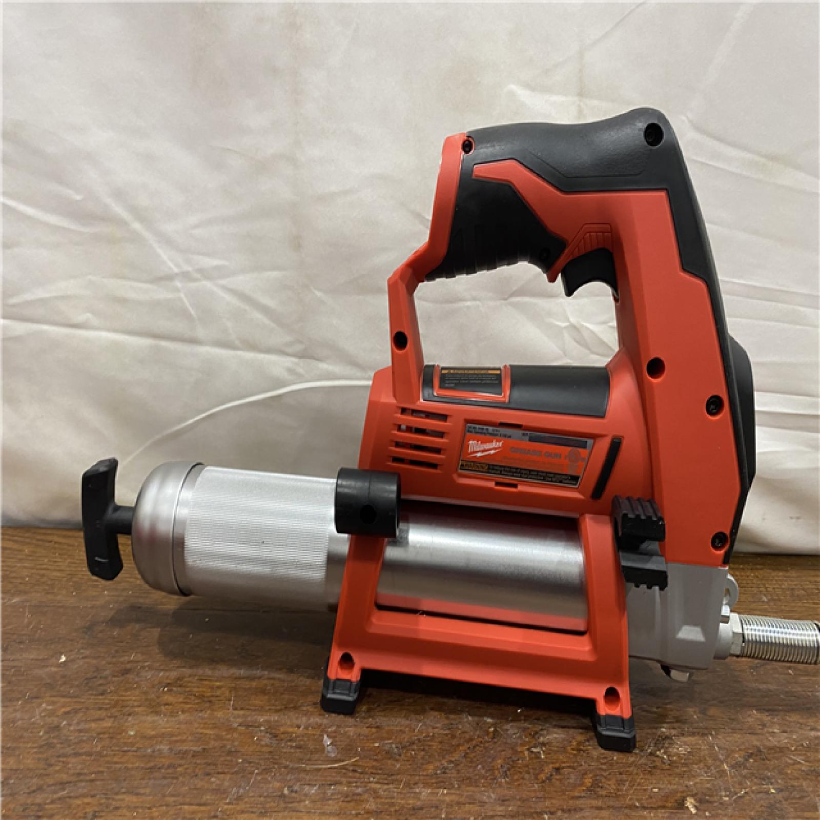 AS-IS Milwaukee Tool 10,000 PSI 14 Oz Battery-Operated Grease Gun - 48 Flexible Hose, 31 Strokes/oz | Part #2646-20