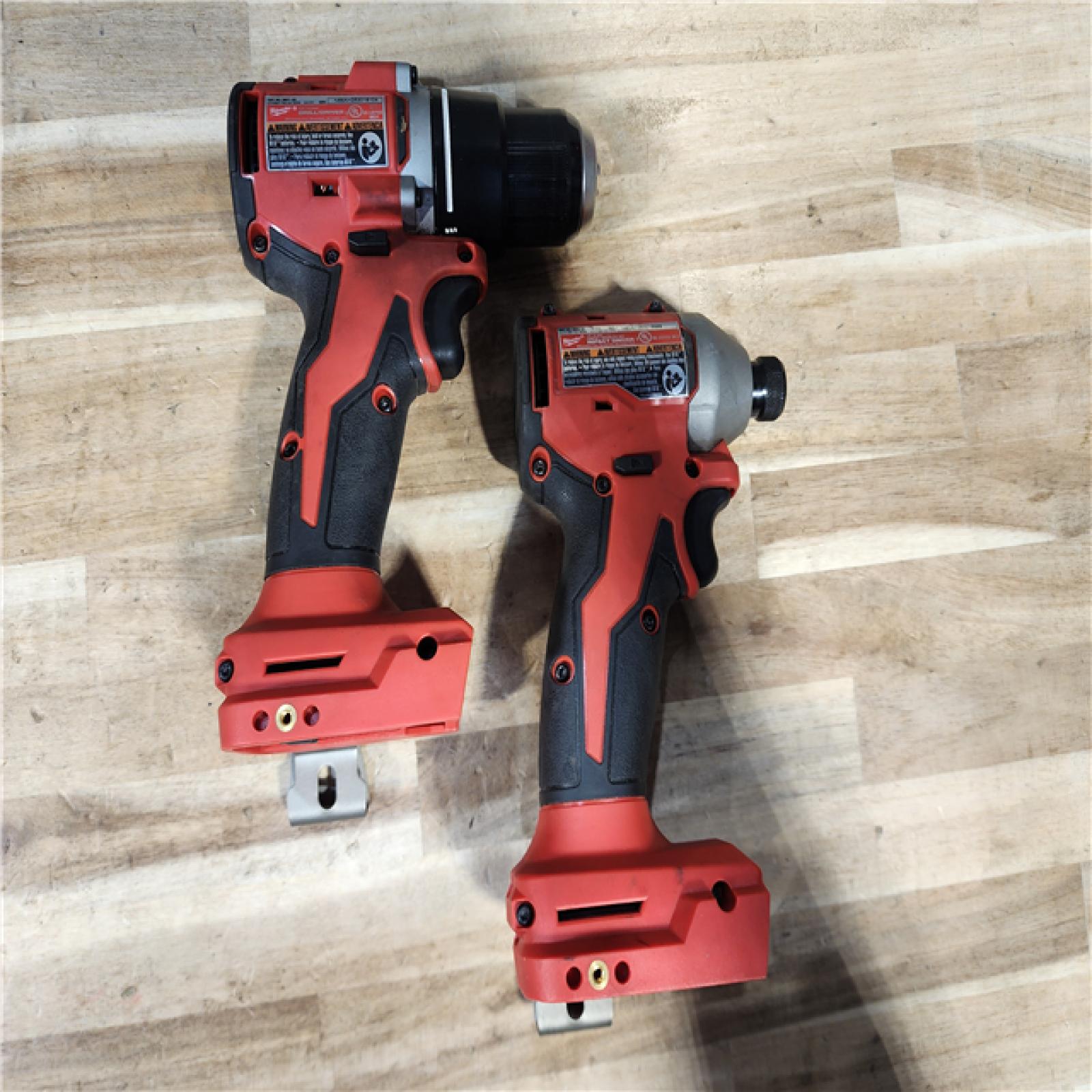HOUSTON LOCATION - AS-IS Milwaukee M18 18V Lithium-Ion Brushless Cordless Compact Drill/Impact Combo Kit (2-Tool) W/(2) 2.0 Ah Batteries  Charger & Bag