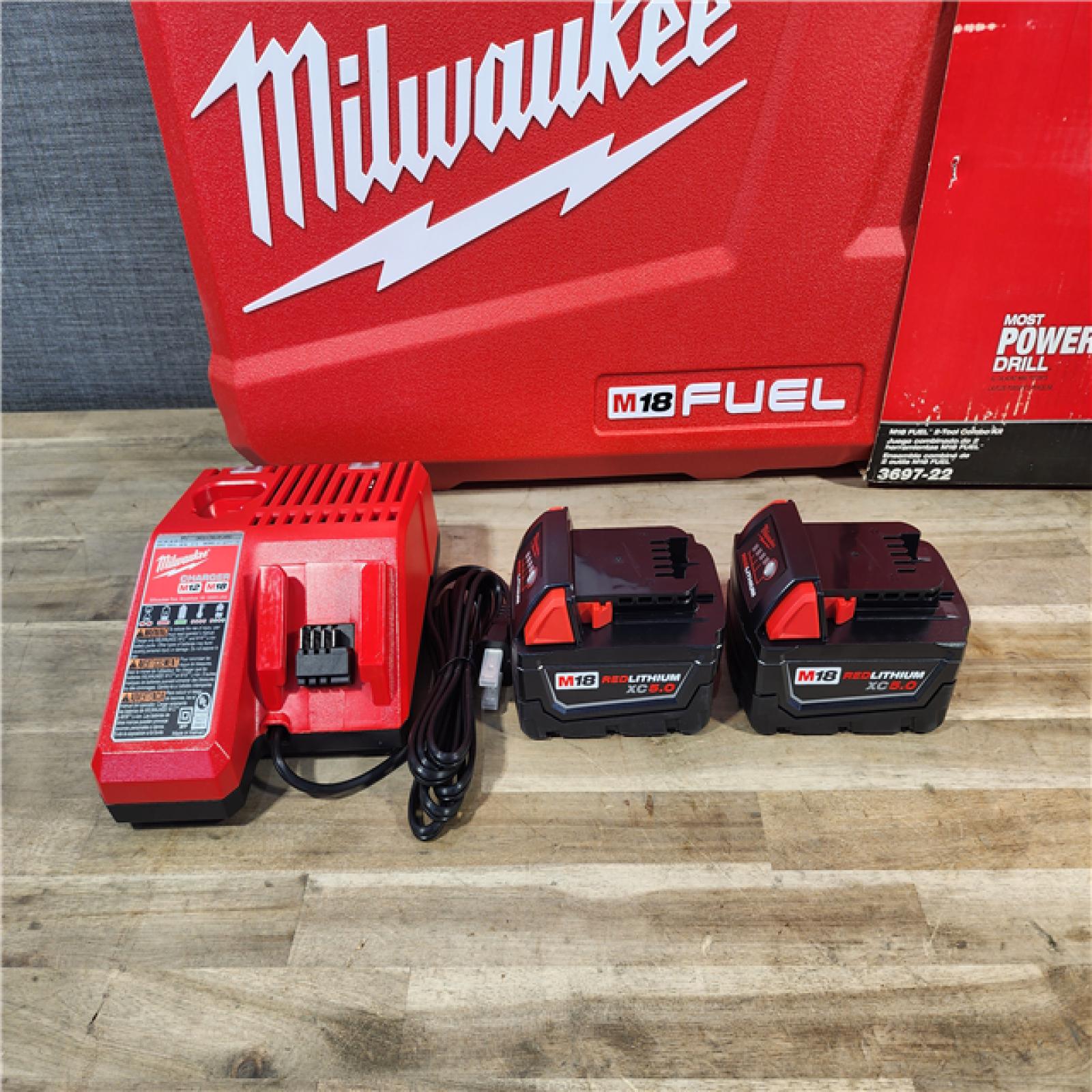 HOUSTON LOCATION - AS-IS (APPEARS LIKE NEW) MILWAUKEE FUEL 18V Lithium-Ion Brushless Cordless Hammer Drill and Impact Driver Combo Kit (2-Tool) with 2 Batteries