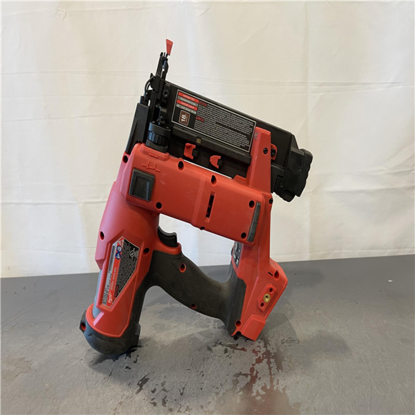 AS-IS - Milwaukee M18 FUEL 18-Volt Lithium-Ion Brushless Cordless Gen II 18-Gauge Brad Nailer