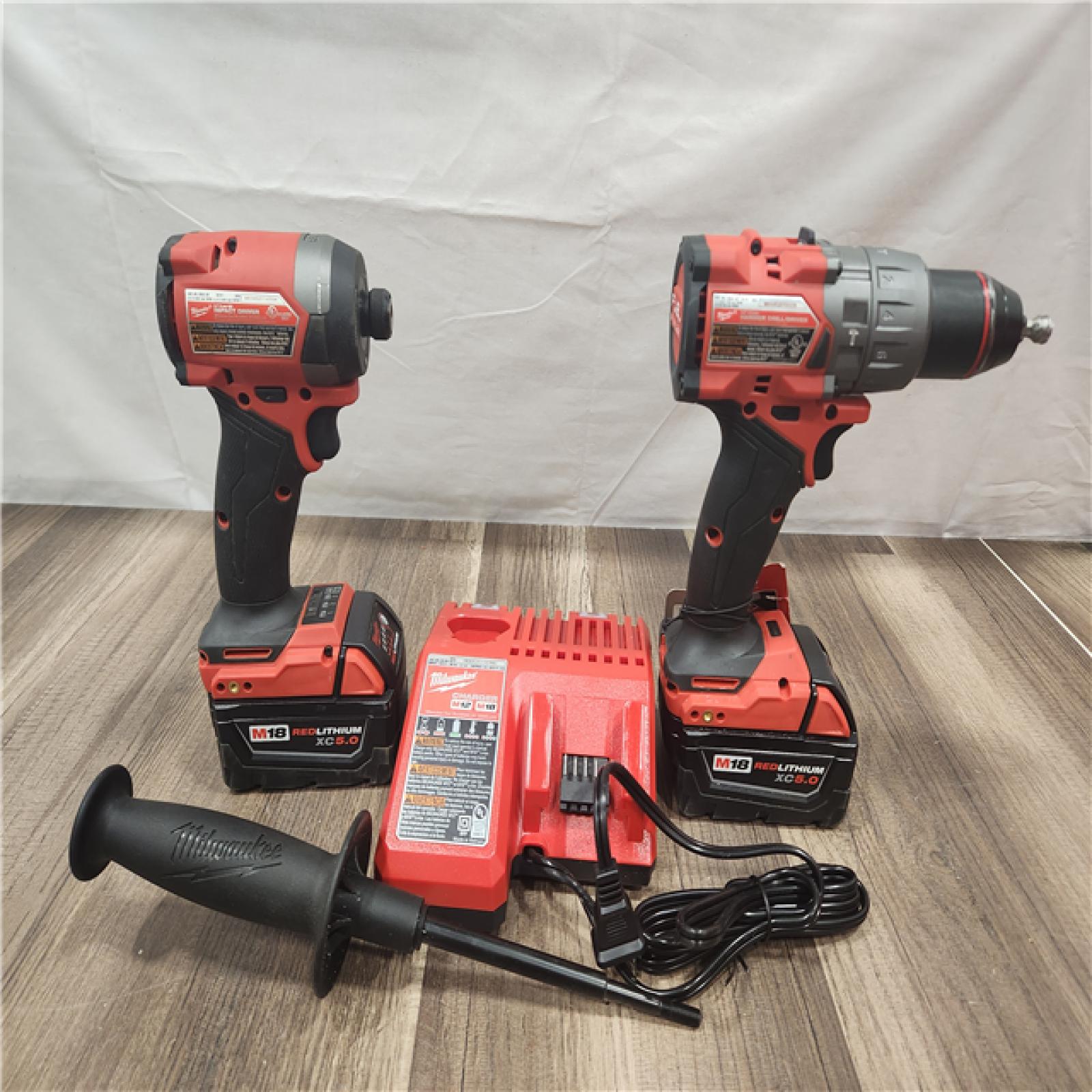 AS-IS- MILWAUKEE FUEL 18V Lithium-Ion Brushless Cordless Hammer Drill and Impact Driver Combo Kit