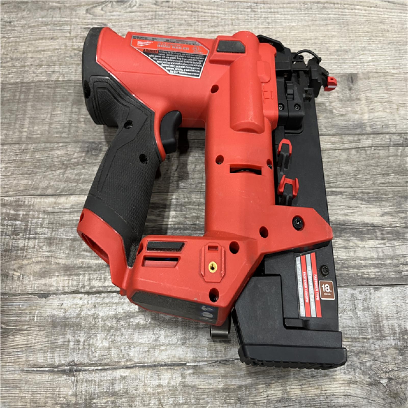AS-IS Milwaukee FUEL 12-Volt Lithium-Ion Brushless Cordless 18-Gauge 1-1/2 in. Compact Brad Nailer (Tool-Only)