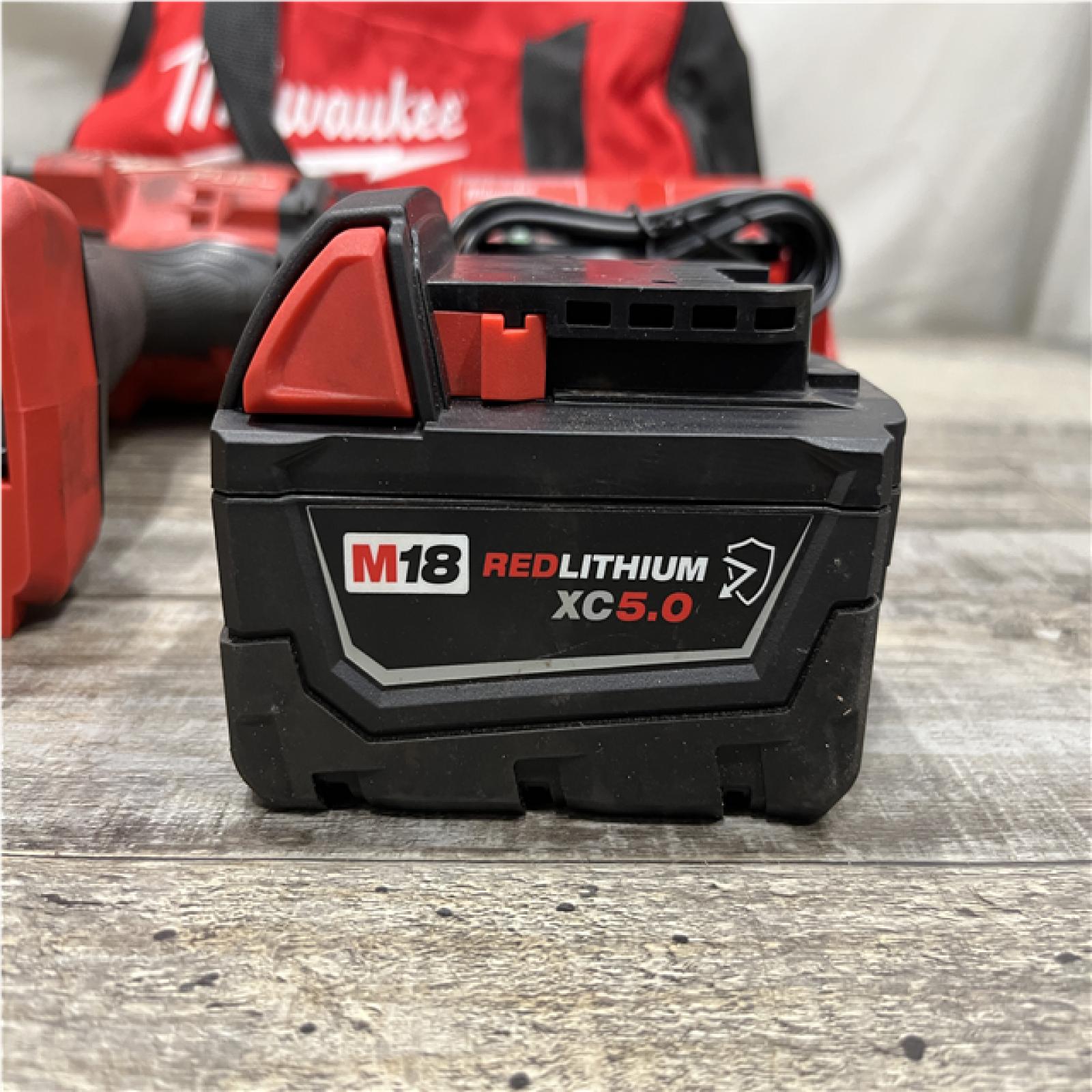 AS-IS Milwaukee FUEL 18V Lithium-Ion Brushless Cordless 1/2 in. Impact Wrench w/Friction Ring Kit