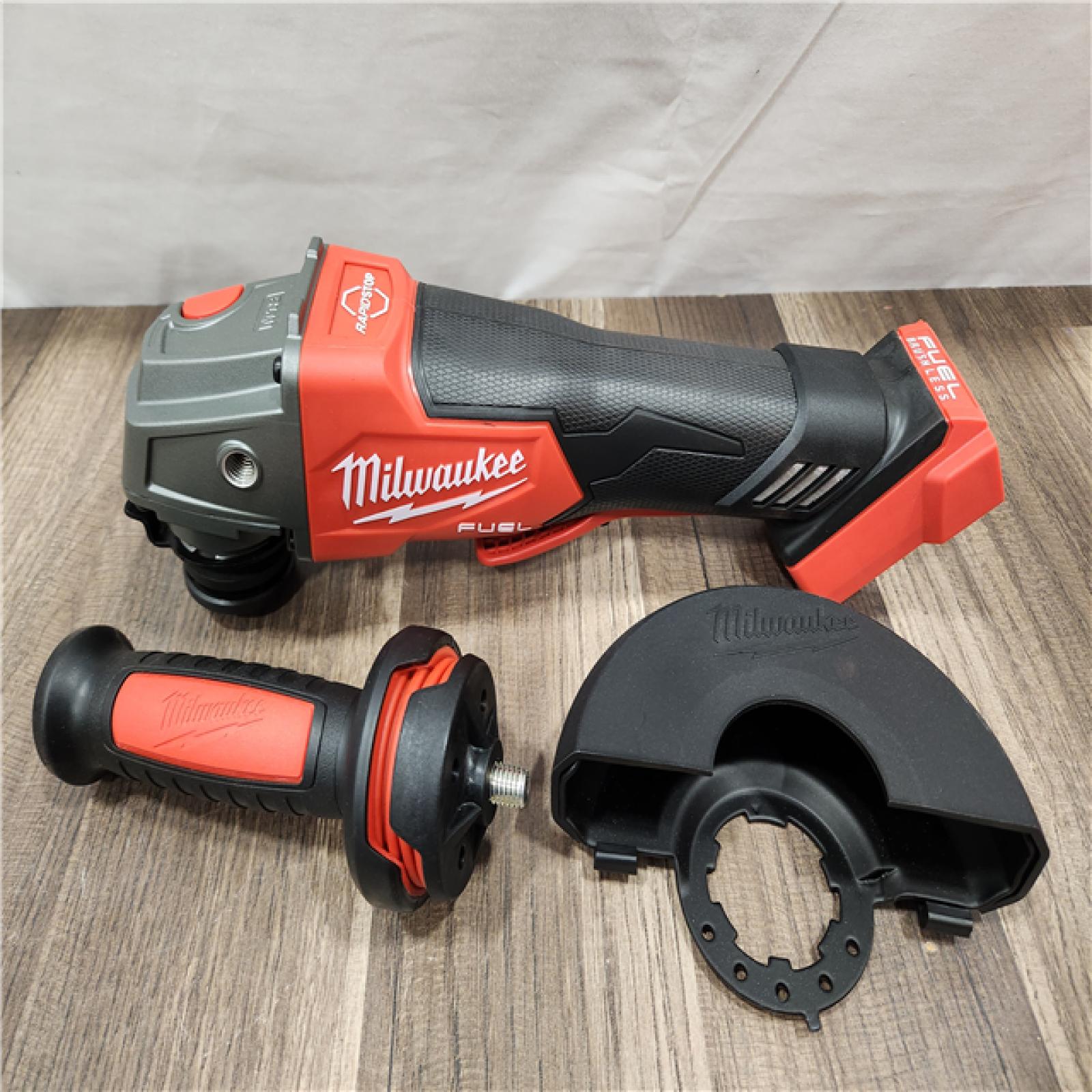 AS-IS- Milwaukee FUEL 18-Volt Lithium-Ion Brushless Cordless 4-1/2 in./5 in. Grinder W/Paddle Switch (Tool-Only)