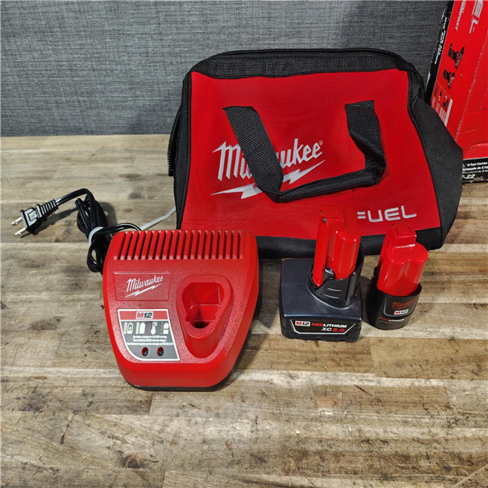 HOUSTON LOCATION - AS-IS Milwaukee FUEL 12-Volt Lithium-Ion Brushless Cordless Hammer Drill and Impact Driver Combo Kit