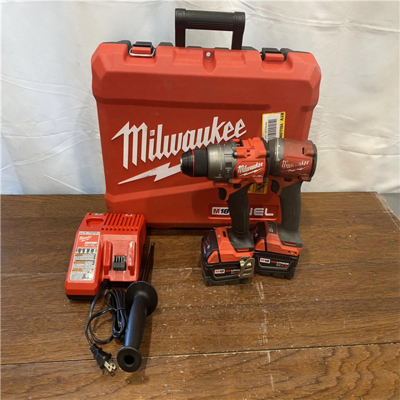 AS-IS M18 FUEL 18V Lithium-Ion Brushless Cordless Hammer Drill and Impact Driver Combo Kit (2-Tool) with 2 Batteries