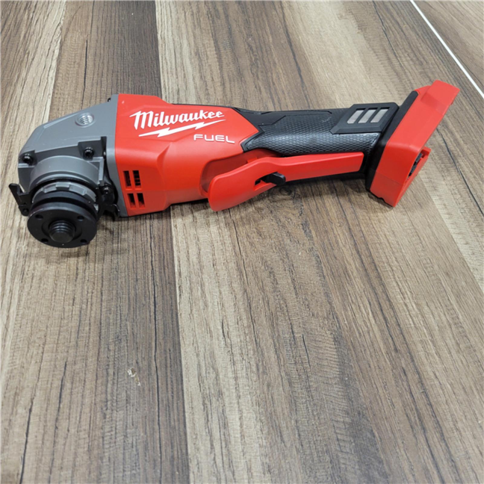 AS-IS Milwaukee  M18 FUEL 18-Volt Lithium-Ion Brushless Cordless 4-1/2 in./5 in. Grinder W/Paddle Switch (Tool-Only)