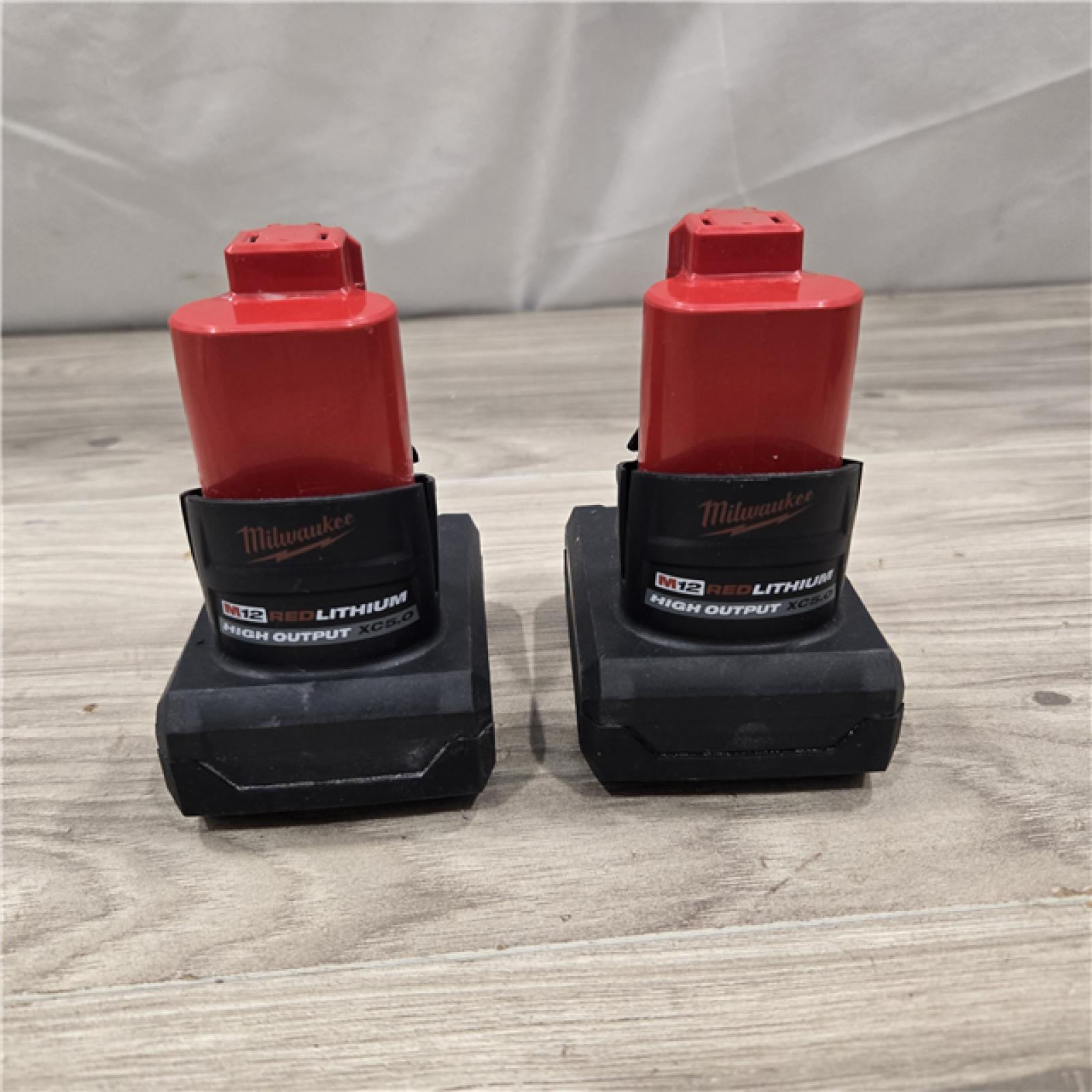 AS-IS Milwaukee M12 12V Lithium-Ion XC High Output 5.0 Ah Battery Pack (2-Pack) Starter Kit