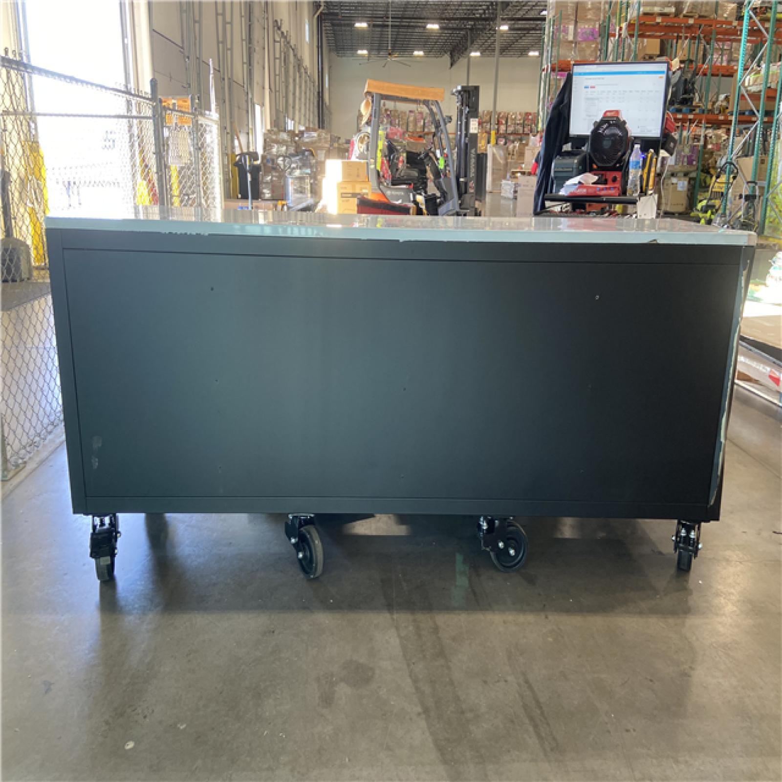DALLAS LOCATION - Husky Tool Storage Heavy Duty 96 in. W x 24 in. D Matte Black Mobile Workbench Cabinet with Stainless Steel Top