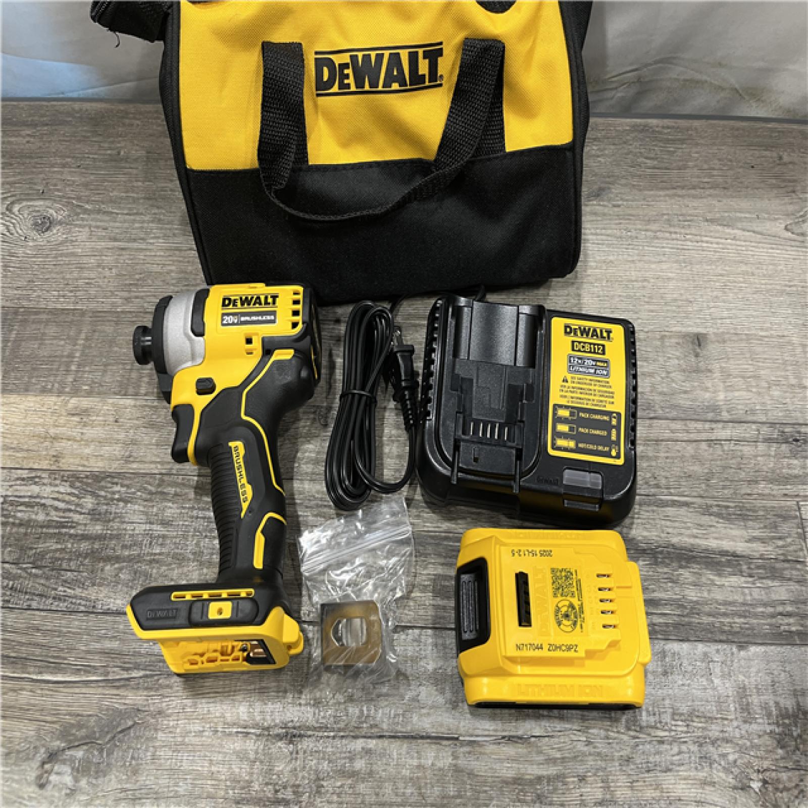AS-IS DEWALT Atomic 20V Max Lithium-Ion Brushless Cordless Compact 1/4 in. Impact Driver Kit