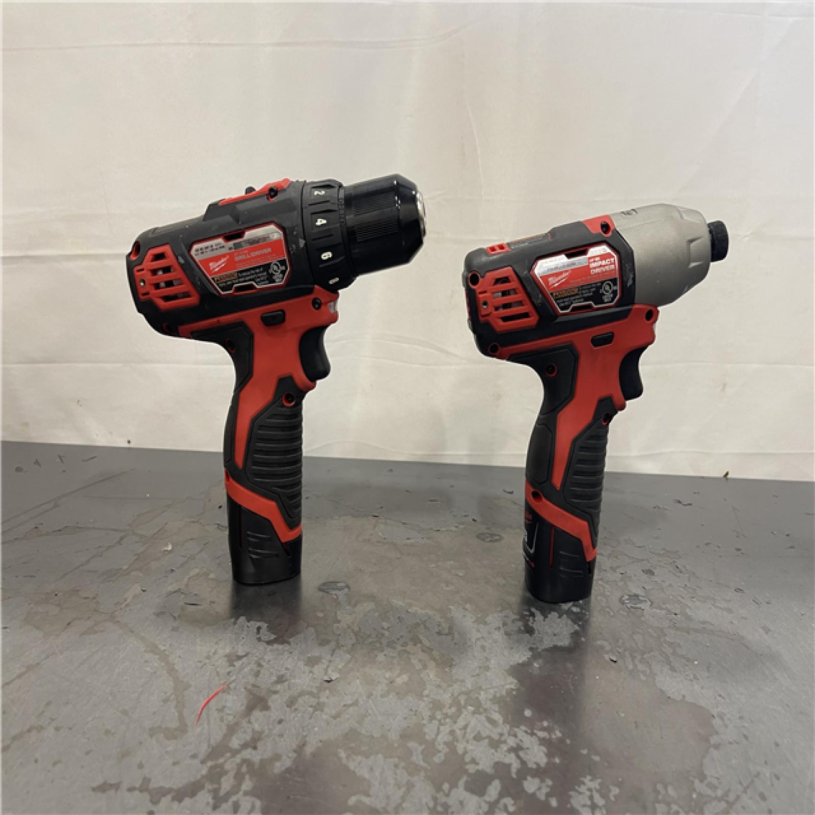 AS-IS-  Milwaukee M12 12V Lithium-Ion Cordless Drill Driver/Impact Driver Combo Kit with Two 1.5Ah Batteries  Charger and Bag (2-Tool)