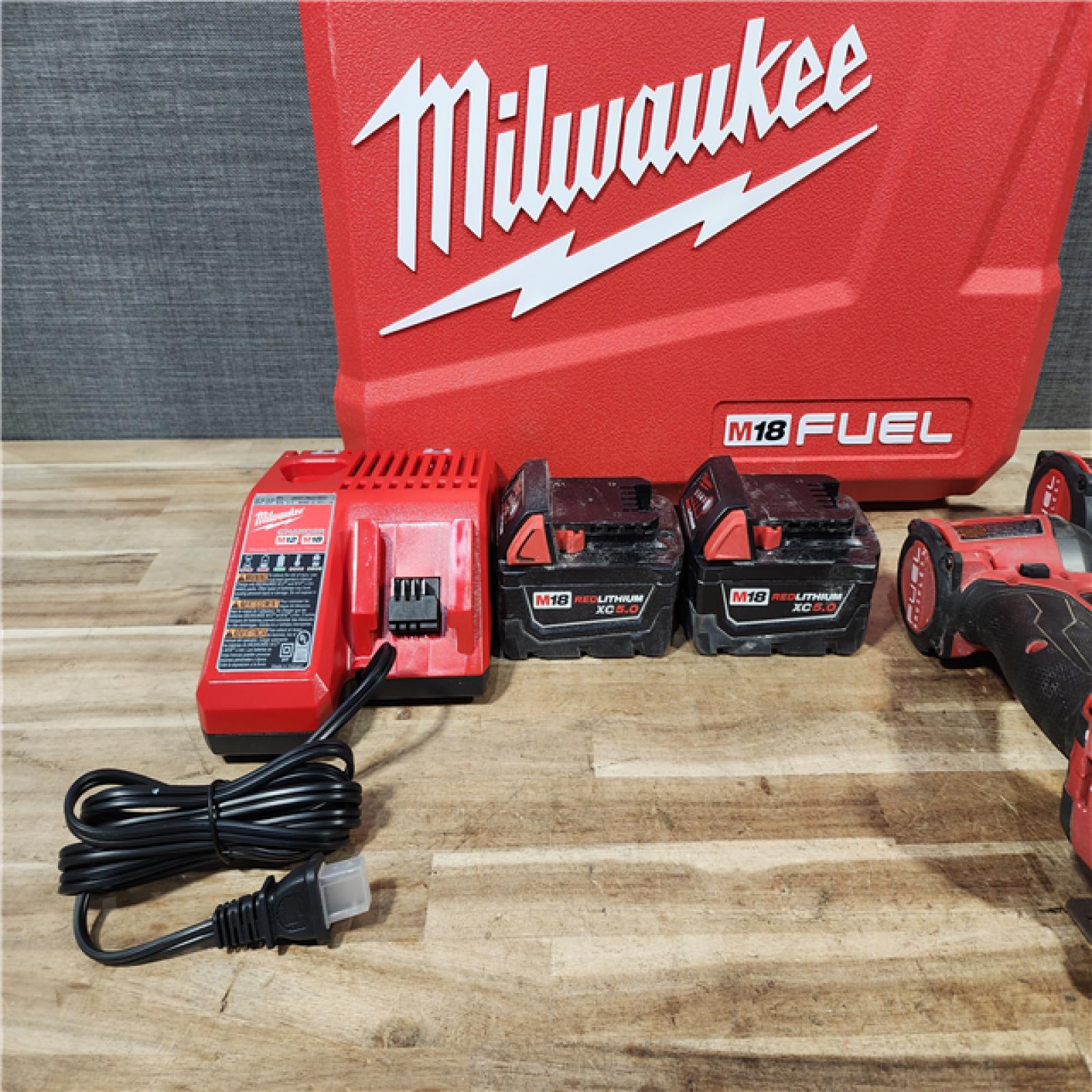 HOUSTON LOCATION - AS - IS Milwaukee FUEL 18V Lithium-Ion Brushless Cordless Hammer Drill and Impact Driver Combo Kit