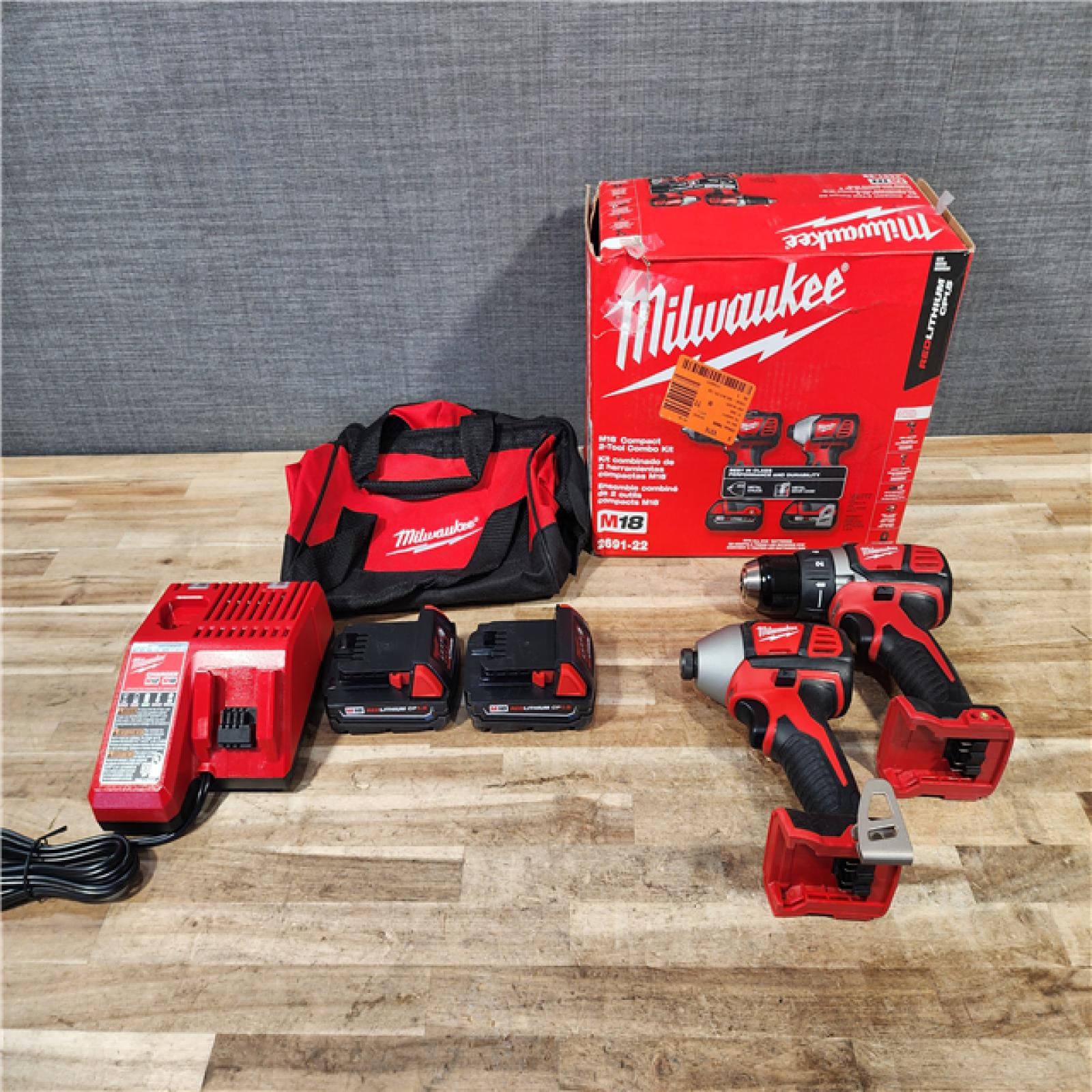 HOUSTON LOCATION - AS-IS Milwaukee 18V Lithium-Ion Cordless Drill Driver/Impact Driver Combo Kit