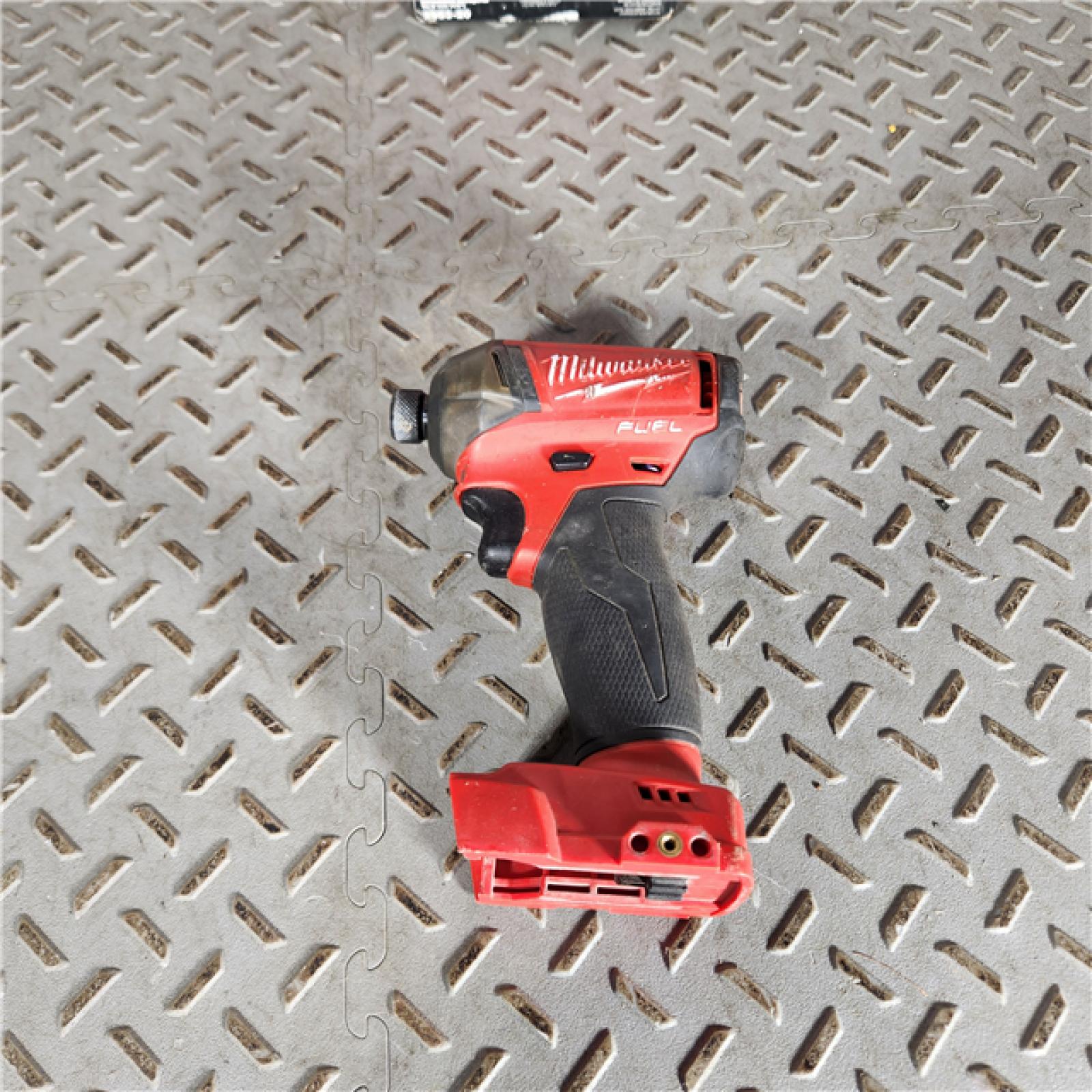 Houston location AS-IS 495-2953-20 M18 Fuel 0.25 in. Hex Impact Driver TOOL ONLY