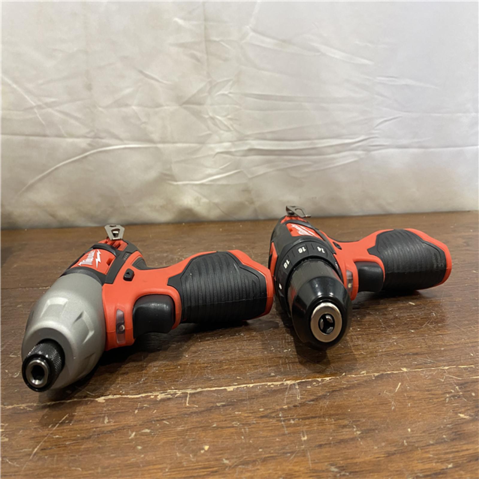 AS-IS Milwaukee 2494-22 M12 Cordless Combination 3/8  Drill / Driver and 1/4  Hex Impact Driver Dual Power Tool Kit (2 Lithium Ion Batteries  Charger  and B
