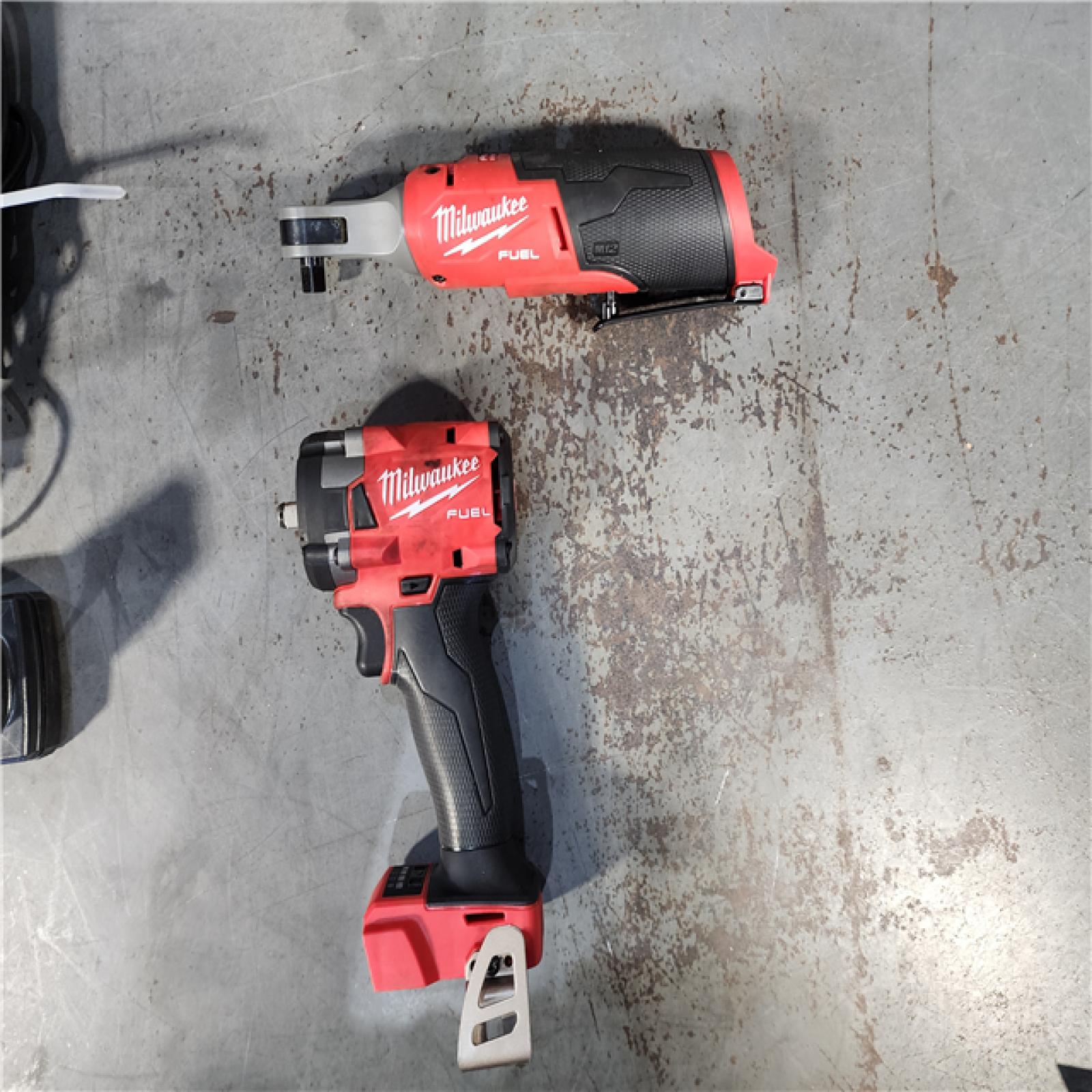 HOUSTON LOCATION - AS-IS MILWAUKEE 2 TOOL COMBO KIT W/ (2) BATTERY & CHARGER