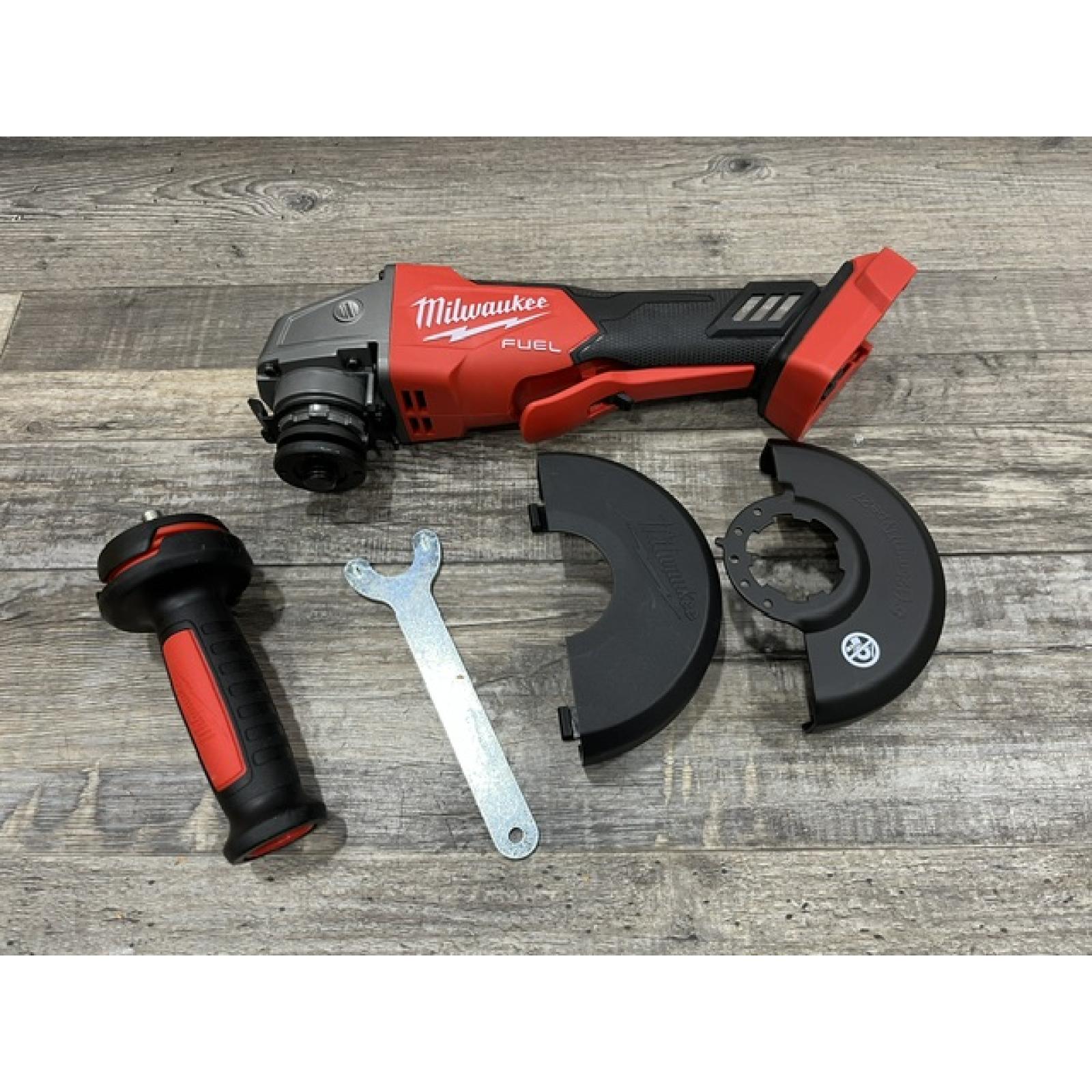 AS-IS Milwaukee FUEL 18V Lithium-Ion Brushless Cordless 4-1/2 in./5 in. Grinder w/Paddle Switch (Tool-Only)
