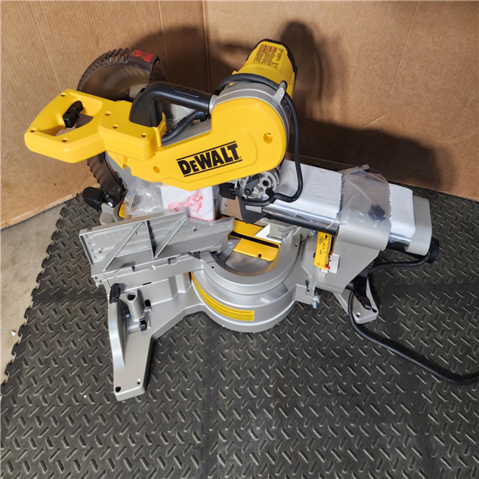 HOUSTON LOCATION - AS-IS (APPEARS LIKE NEW) DEWALT 15 Amp Corded 12 in. Double Bevel Sliding Compound Miter Saw, Blade Wrench and Material Clamp