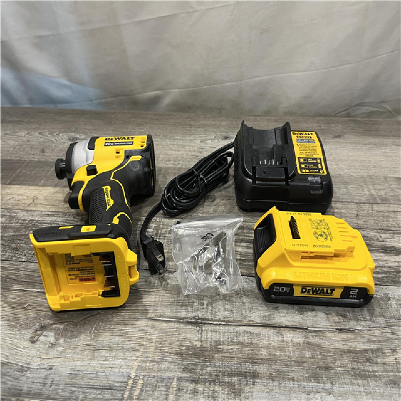 AS-IS DEWALT Atomic 20V Max Lithium-Ion Brushless Cordless Compact 1/4 in. Impact Driver Kit