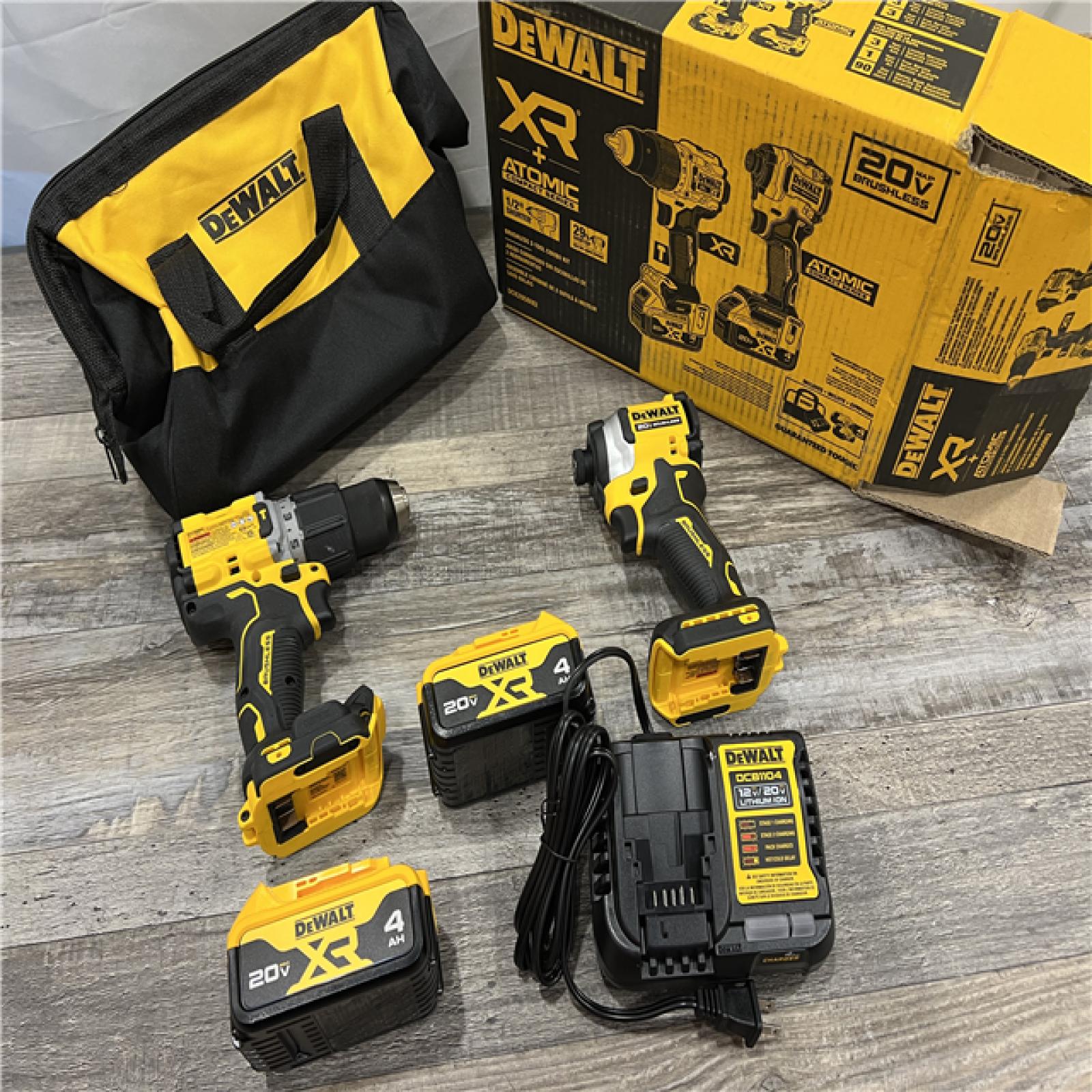 AS-IS DEWALT 20V MAX XR Hammer Drill and ATOMIC Impact Driver 2 Tool Cordless Combo Kit with (2) 4.0Ah Batteries, Charger, and Bag