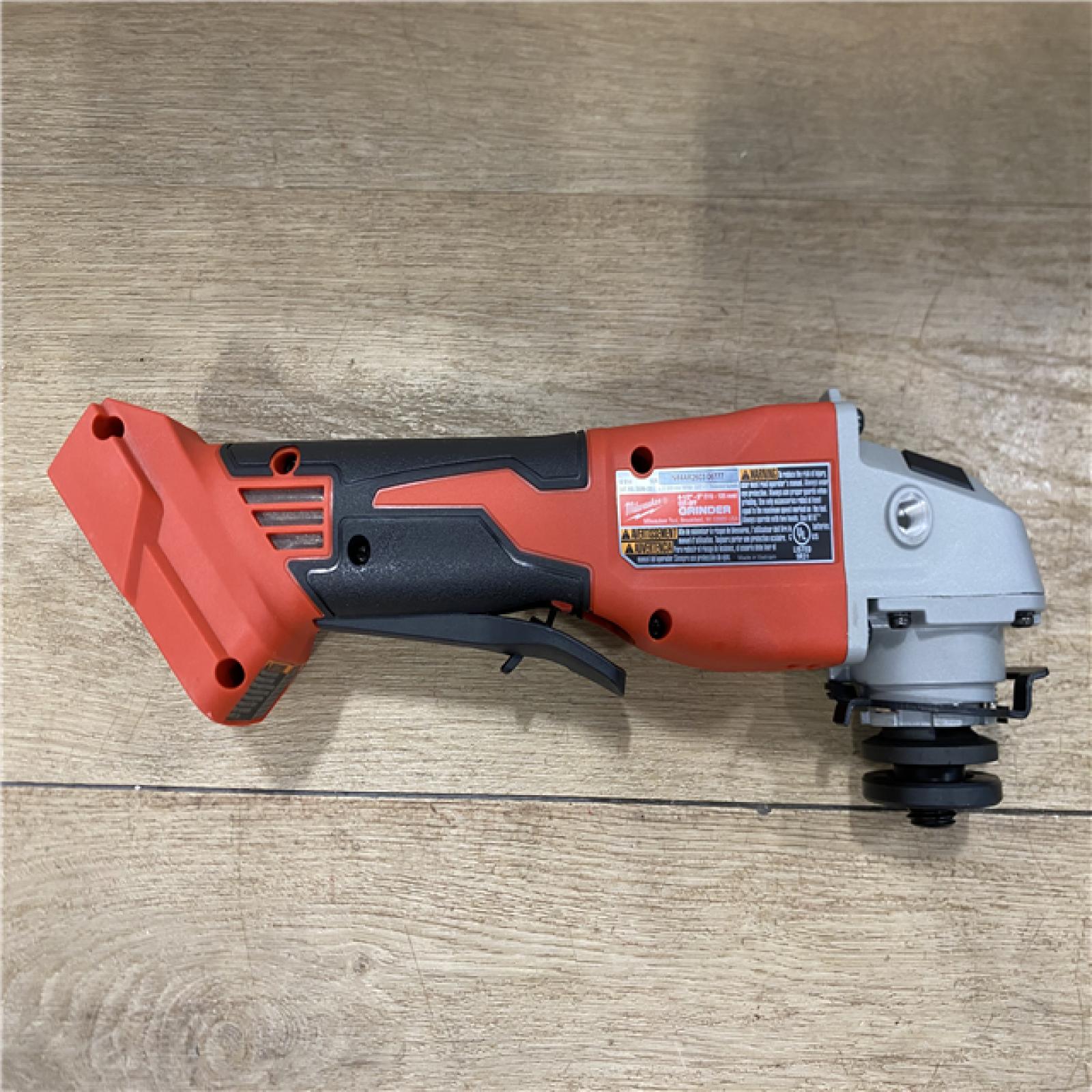 AS-IS Milwaukee 18V Lithium-Ion Brushless Cordless 4-1/2 in./5 in. Grinder w/Paddle Switch (Tool-Only)