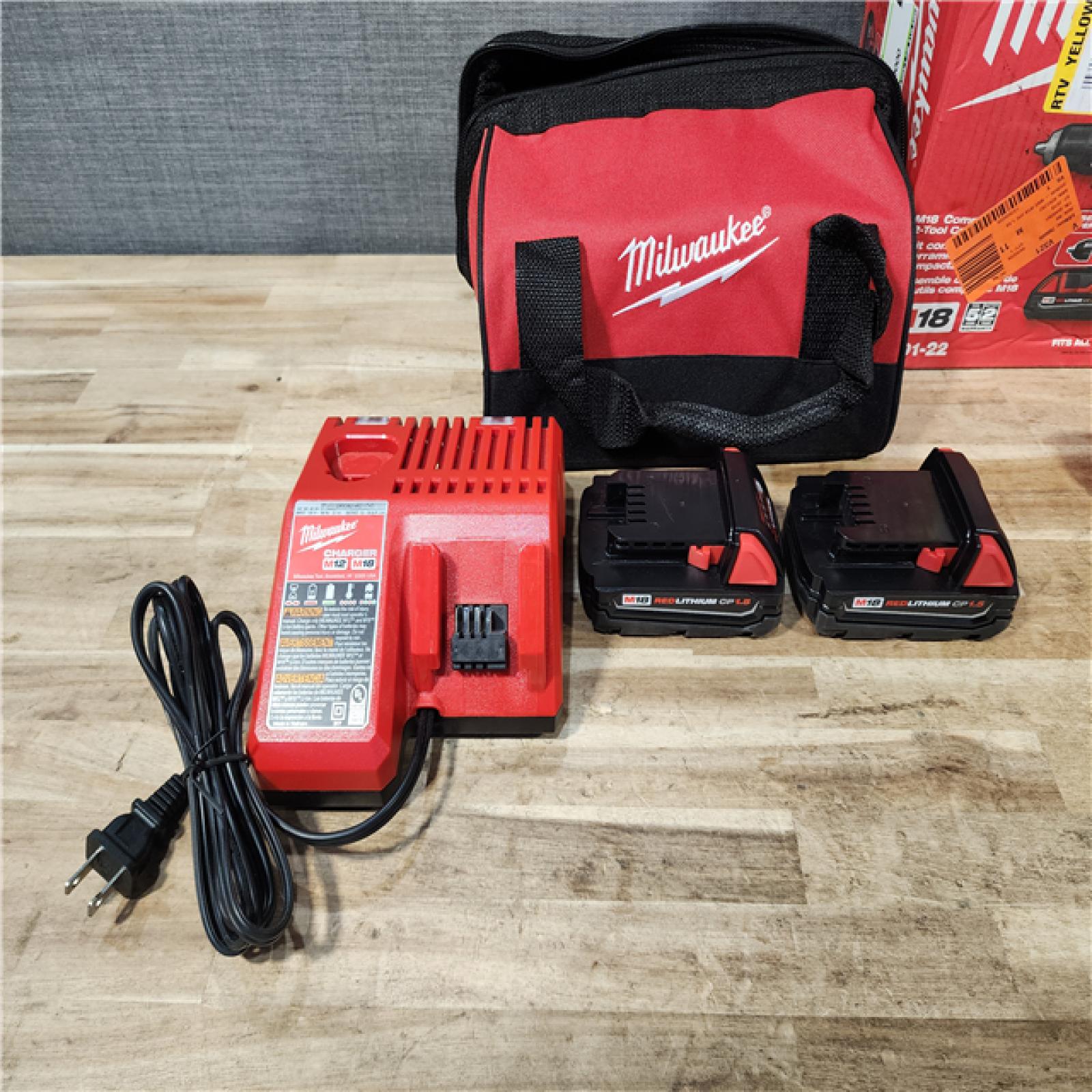 HOUSTON LOCATION - AS-IS Milwaukee 18V Lithium-Ion Cordless Drill Driver/Impact Driver Combo Kit