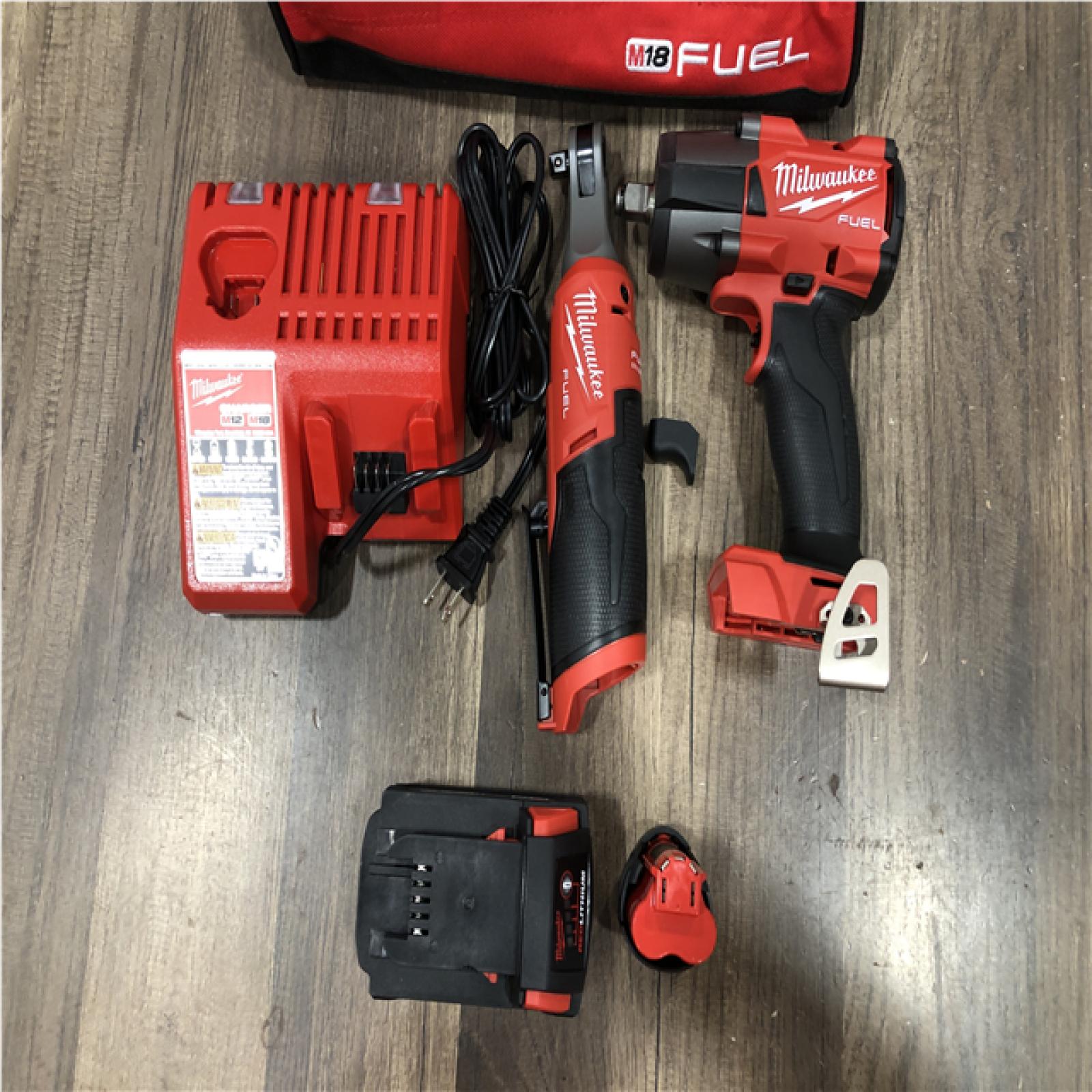 AS-IS Milwaukee FUEL 18V Cordless Mid Torque 1/2 in. Impact Wrench w/ 12 FUEL 3/8 in. Ratchet Combo Kit