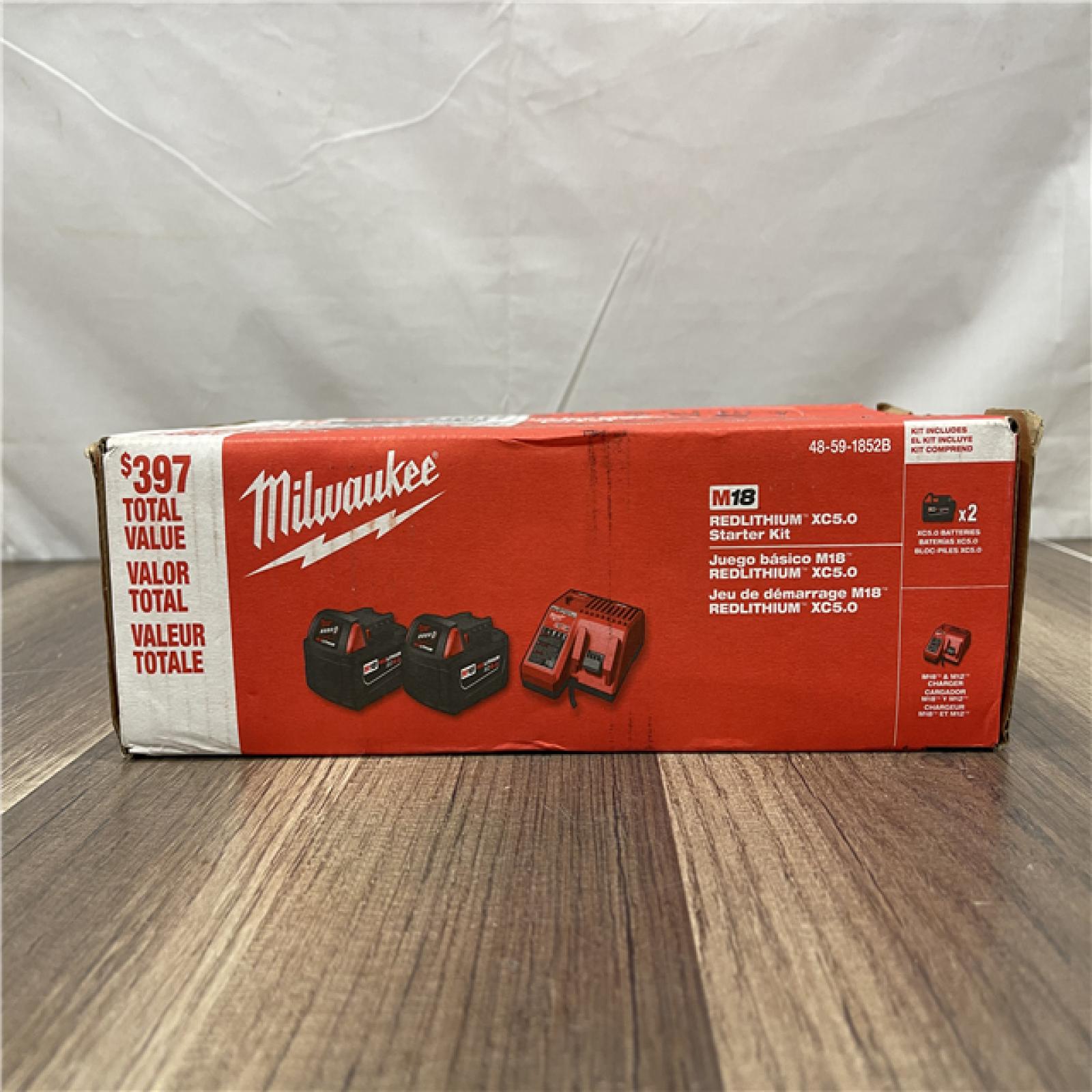 NEW! Milwaukee 18-Volt Lithium-Ion XC Starter Kit with Two 5.0Ah Batteries and Charger