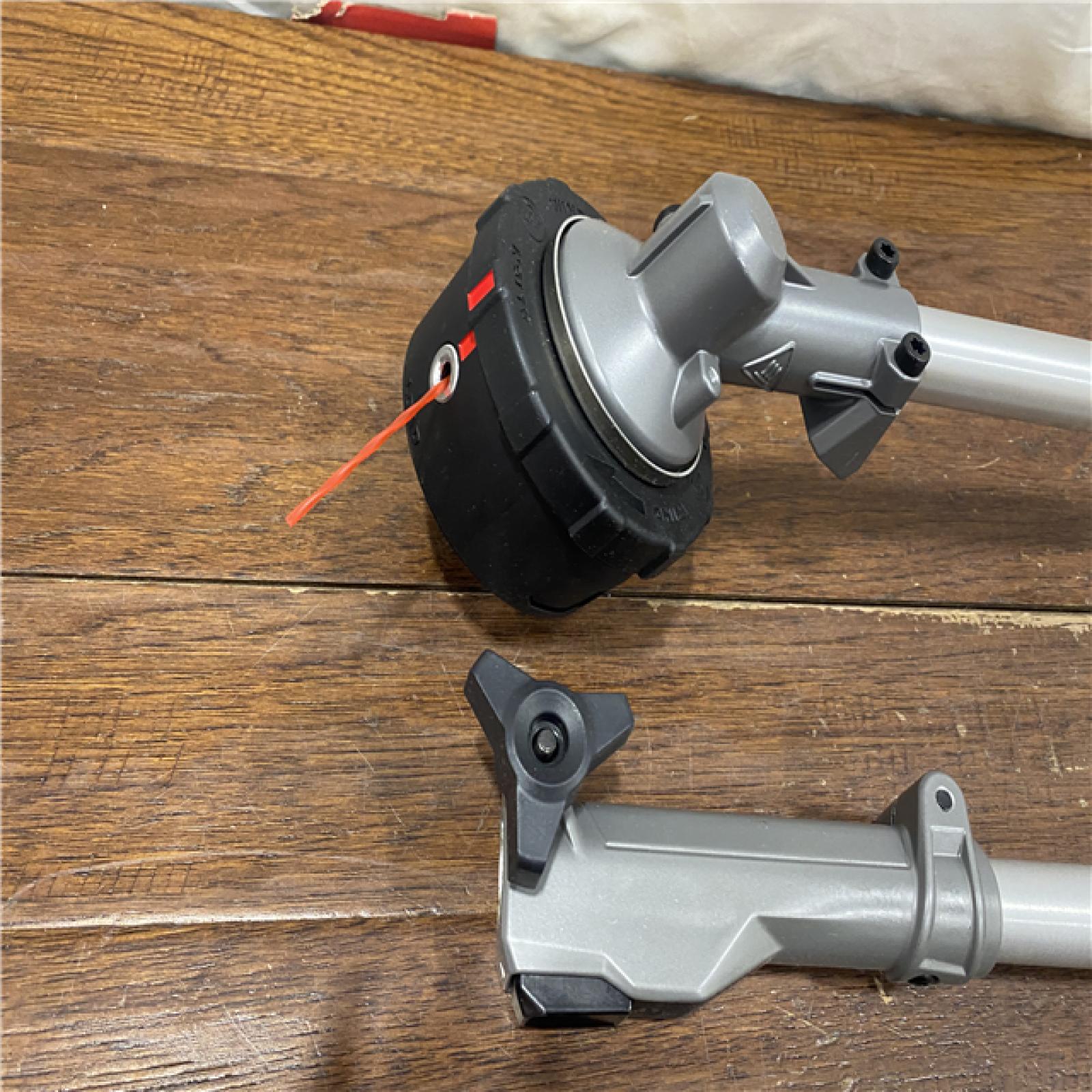 AS-IS M18 FUEL 18V 16 in. Brushless Cordless Battery Powered String Trimmer W/QUIK-LOK Attachment Capability & 8.0 Ah Battery