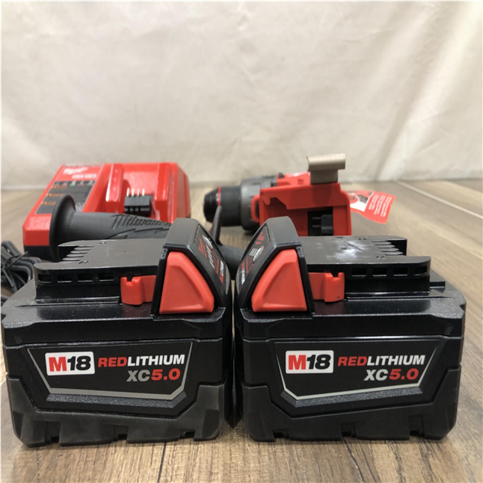 AS-IS Milwaukee FUEL 18V Lithium-Ion Brushless Cordless 1/2 in. Hammer Drill Driver Kit