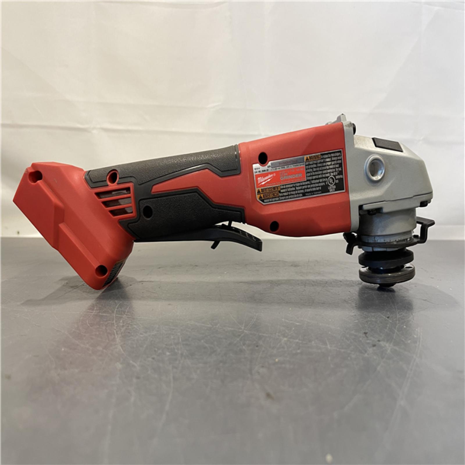 AS-IS - Milwaukee 18V Cordless 4.5 /5  Grinder W/ Paddle Switch (Tool Only)